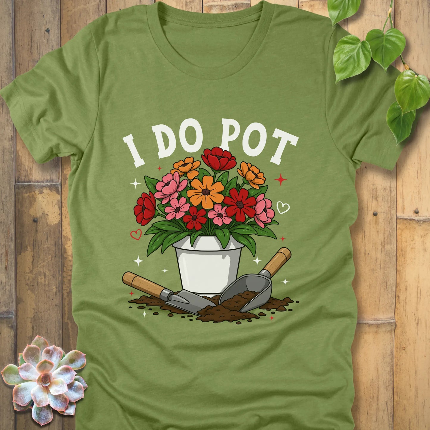 Heather Green t-shirt featuring the design I Do Pot printed in bold letters with plants in the pot