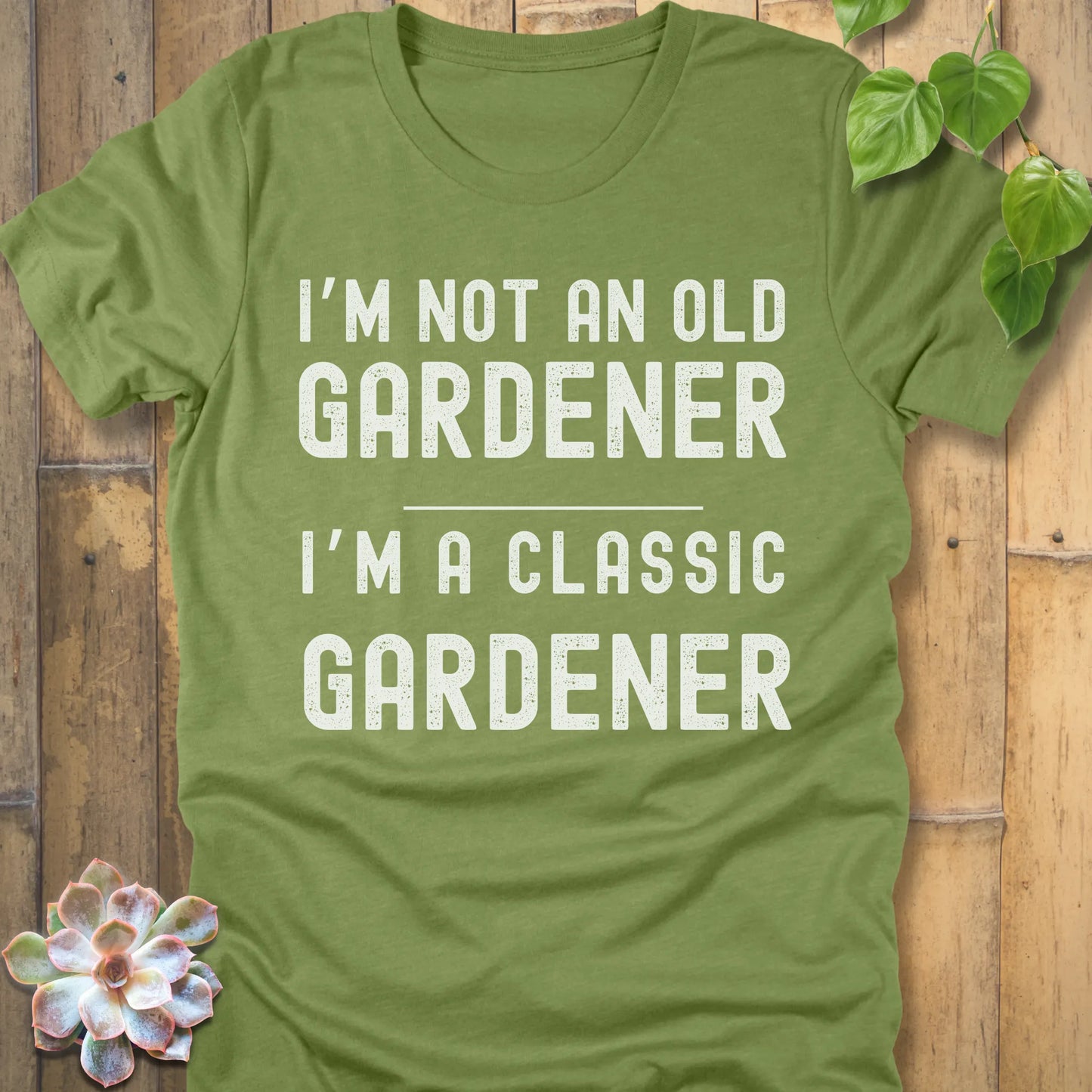 Heather Green t-shirt featuring the design I'm Not An Old Gardener printed in bold black letters, funny gardening fall shirt.