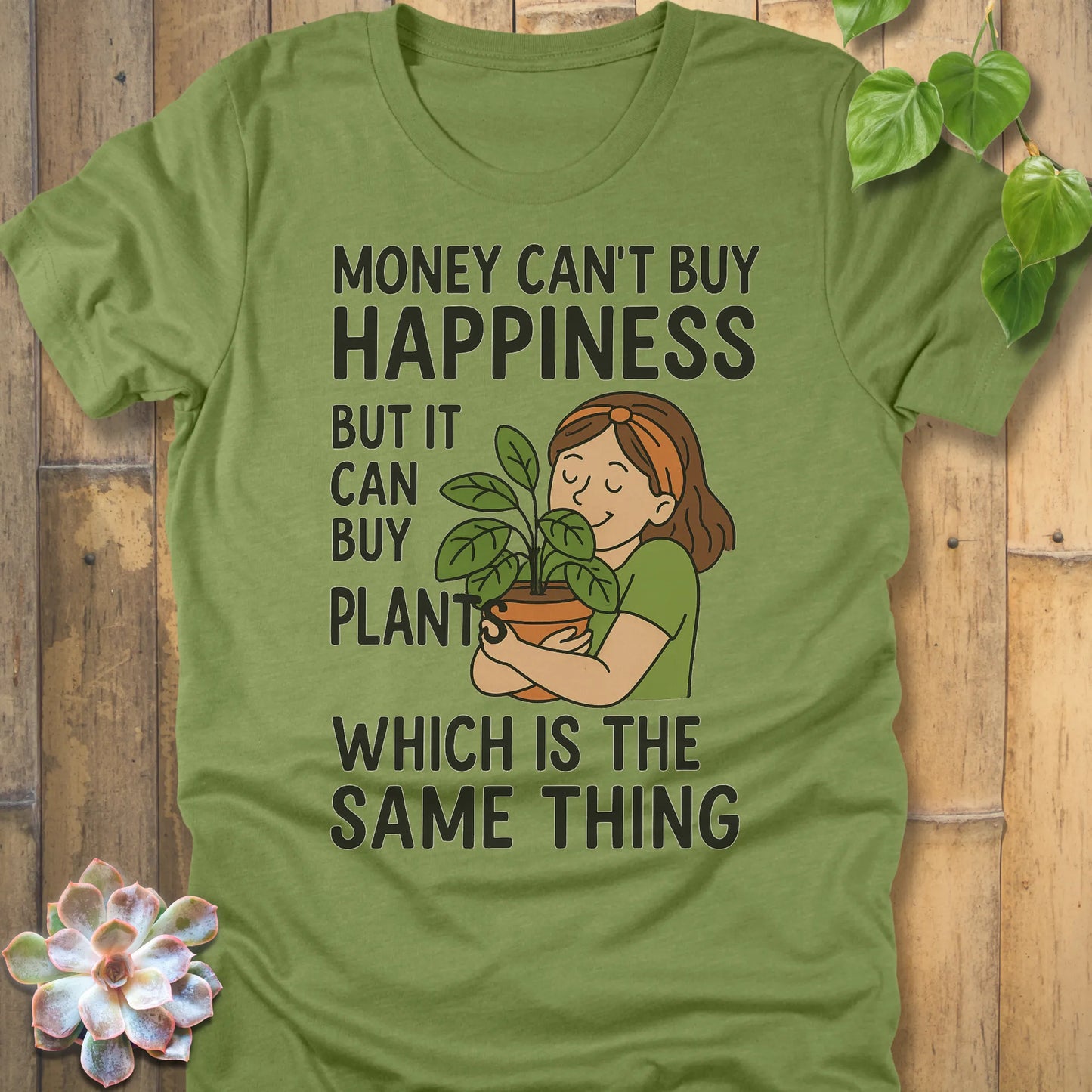 Heather Green t-shirt featuring the design Money Can Buy Happiness printed in bold black letters, casual streetwear shirt.
