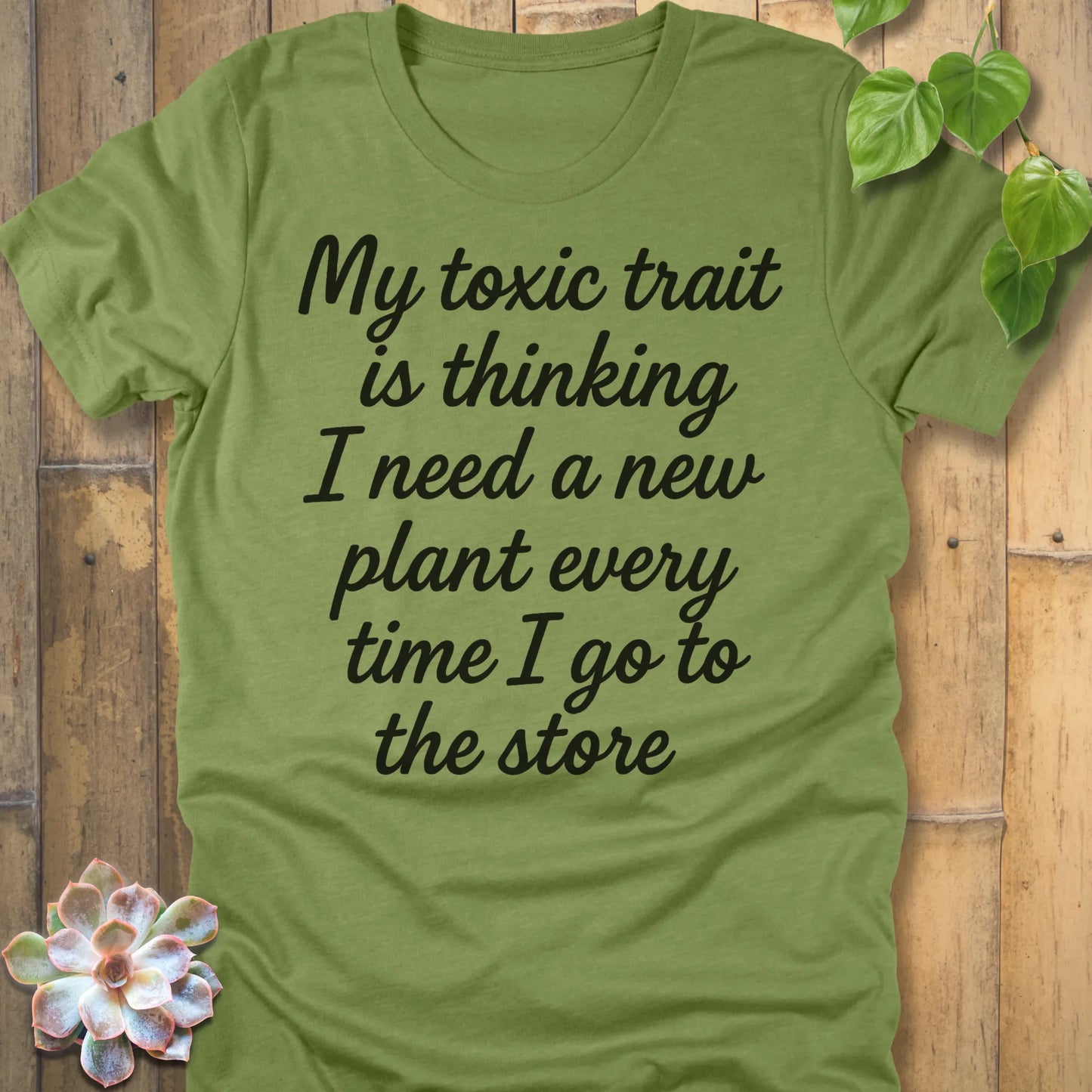 Heather Green t-shirt featuring the design My Toxic Trait printed in black letters, funny quote shirt.
