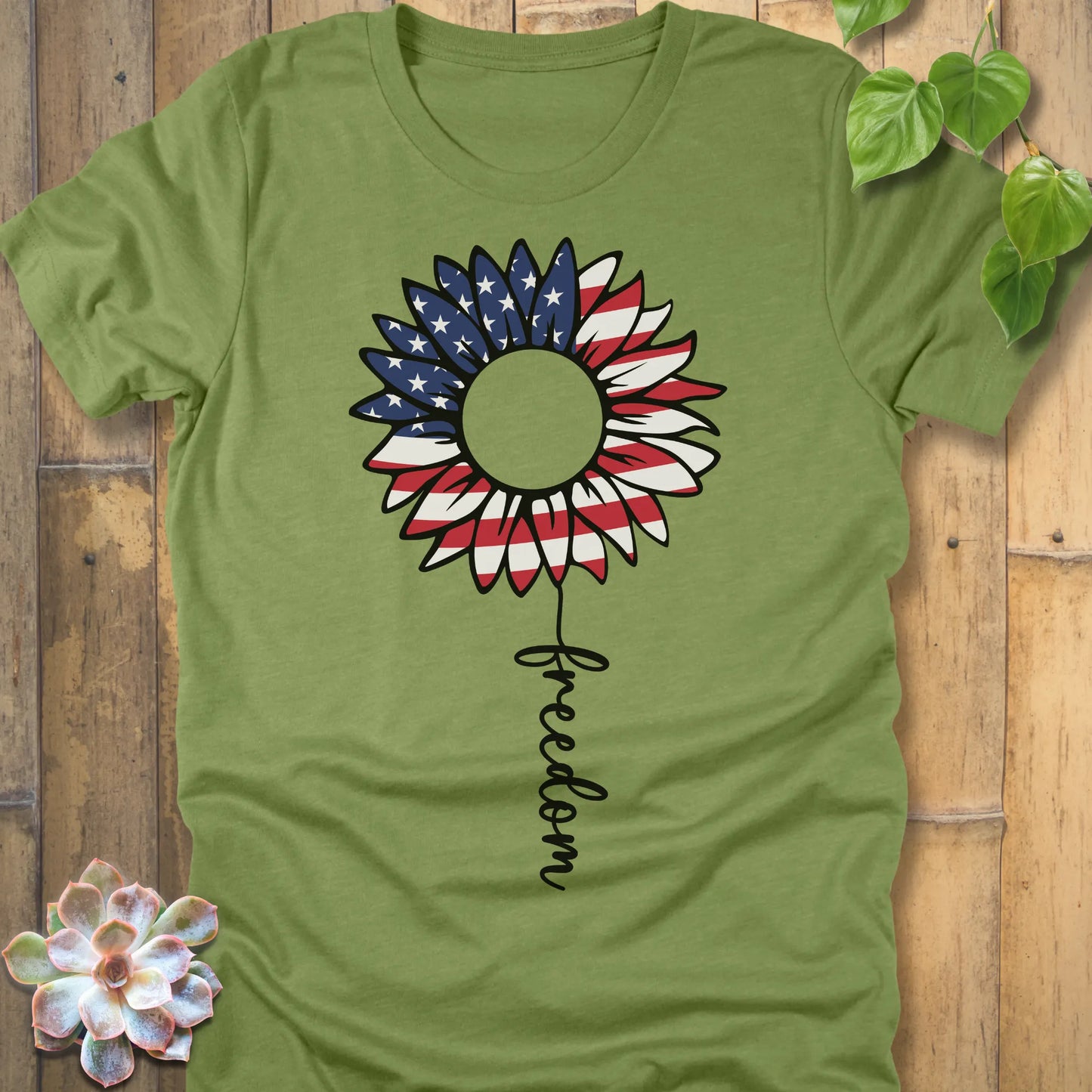 Heather Green t-shirt featuring the design Patriotic Sunflower printed white and blue, USA flower shirt.