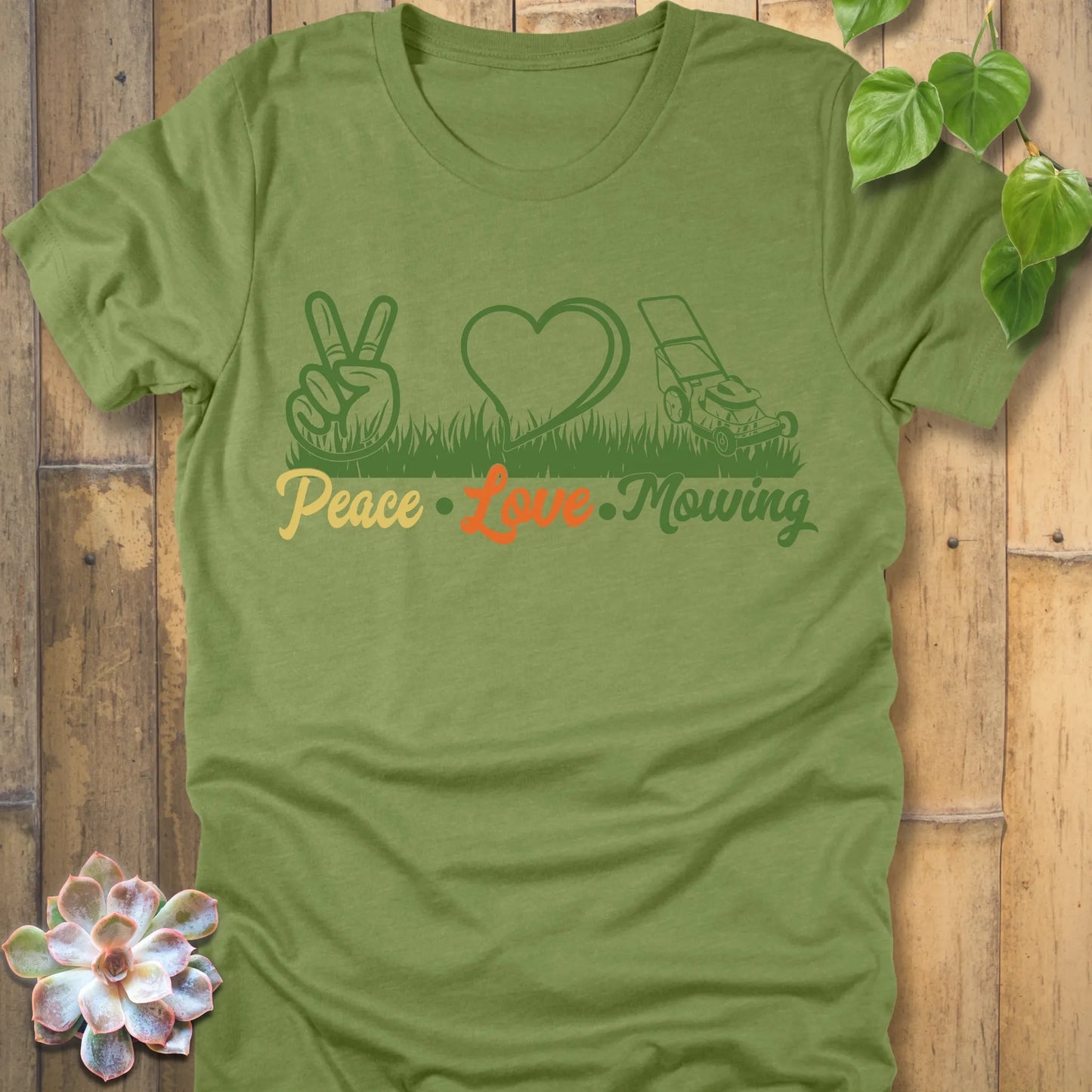 Heather Green t-shirt featuring the design Peace, Love, Mowing with peace sign, heart and mower