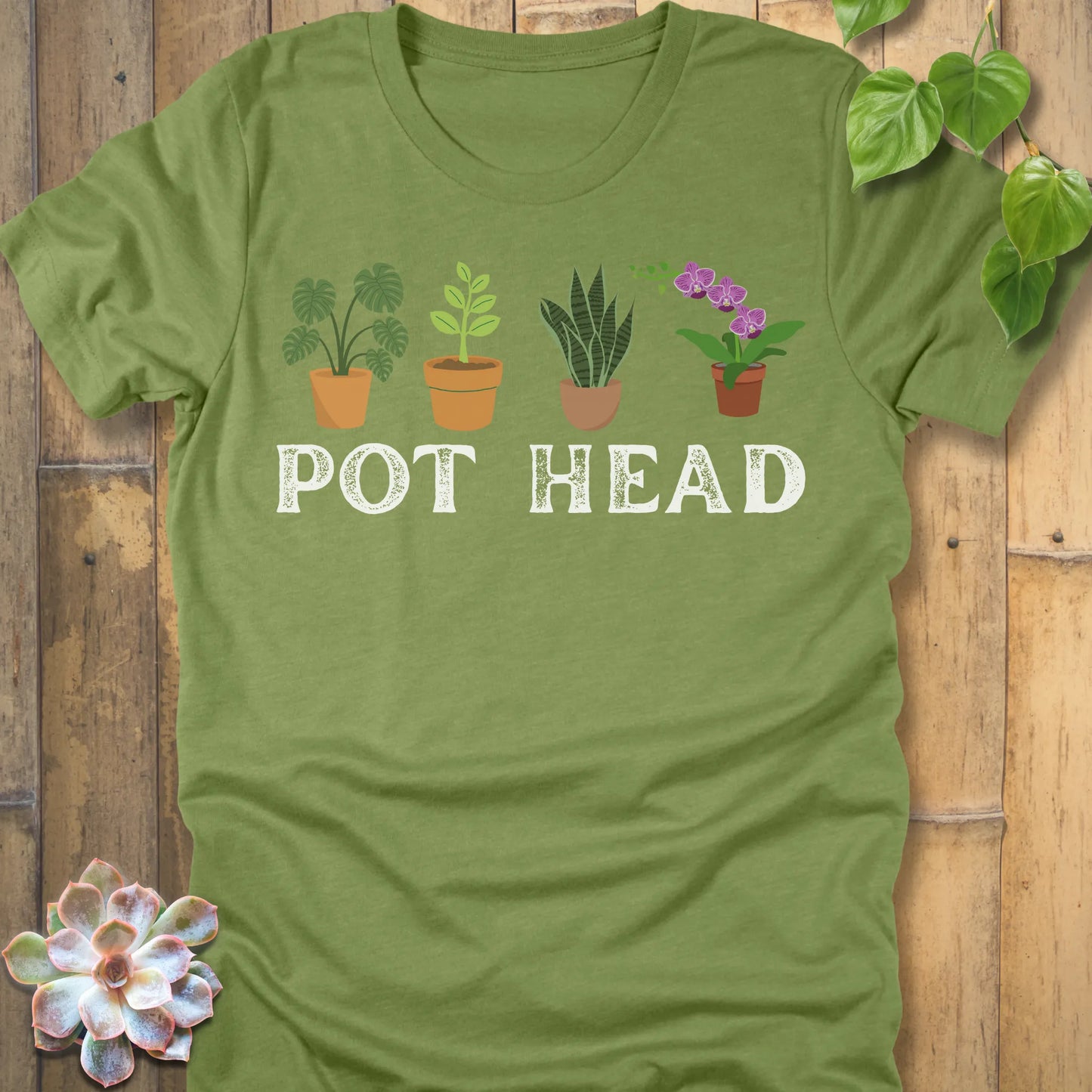 Heather Green t-shirt featuring the design Pot Head printed in bold letters and plants in the pots, funny gardening shirt.