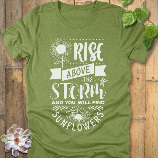 Heather Green t-shirt featuring the design Rise above the storm and you will find sunflowers printed in white letters