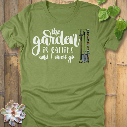 Heather Green t-shirt featuring the design The Garden Is Calling printed in white letters, casual garden shirt.