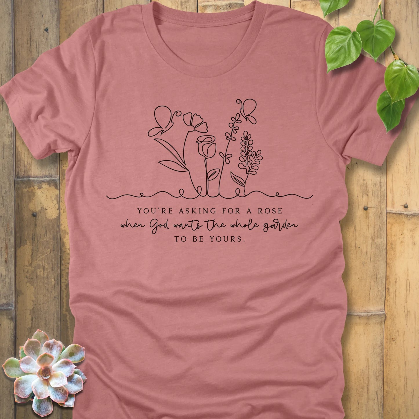 Heather Mauve t-shirt featuring the design Asking for a rose, printed in black letters, soft pastel cotton shirt