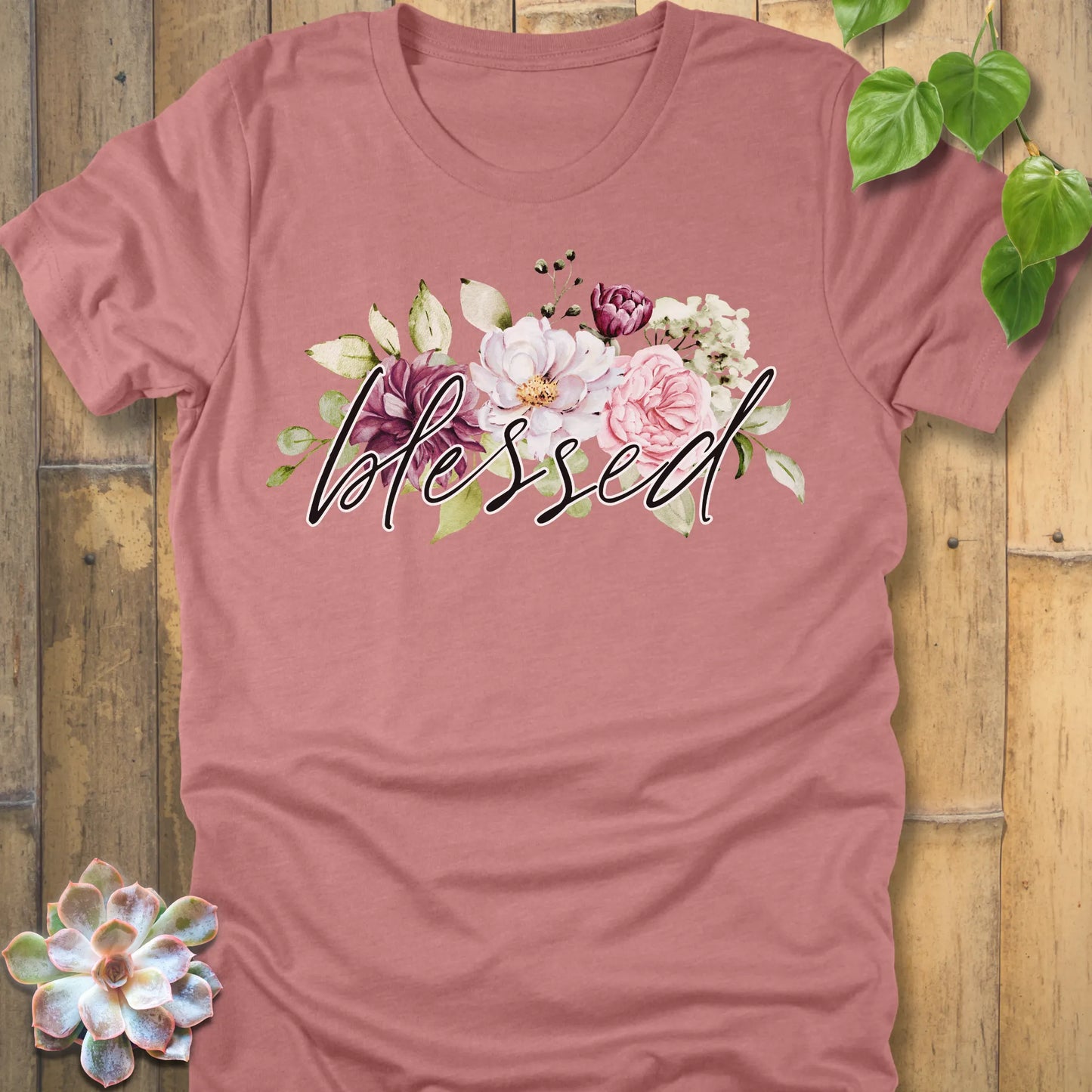Heather Mauve t-shirt featuring the design Blessed Flowers printed black letters and flowers, faith and floral shirt.