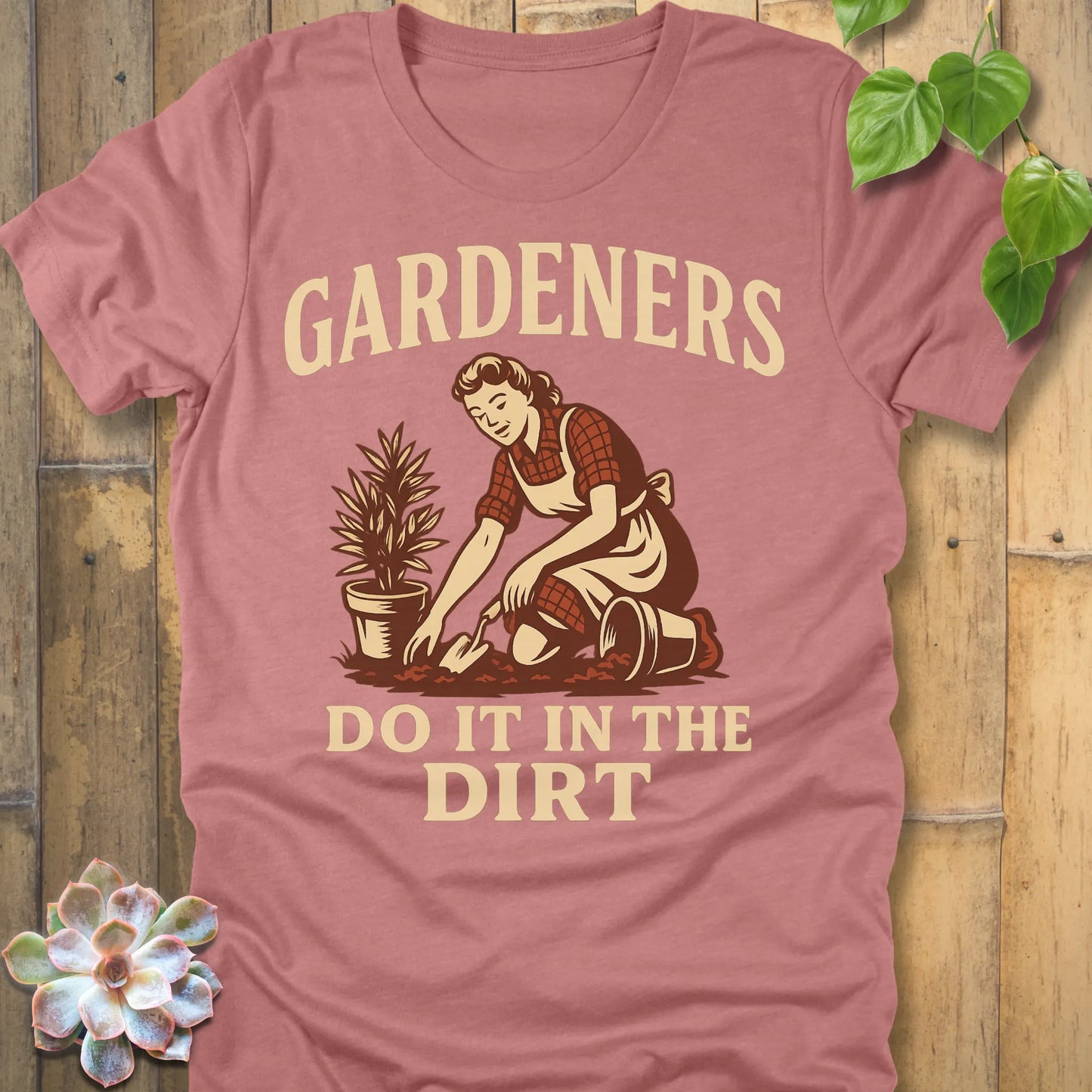 Heather Mauve t-shirt featuring the design Do It In The Dirt printed in bold letters, funny gardening shirt.