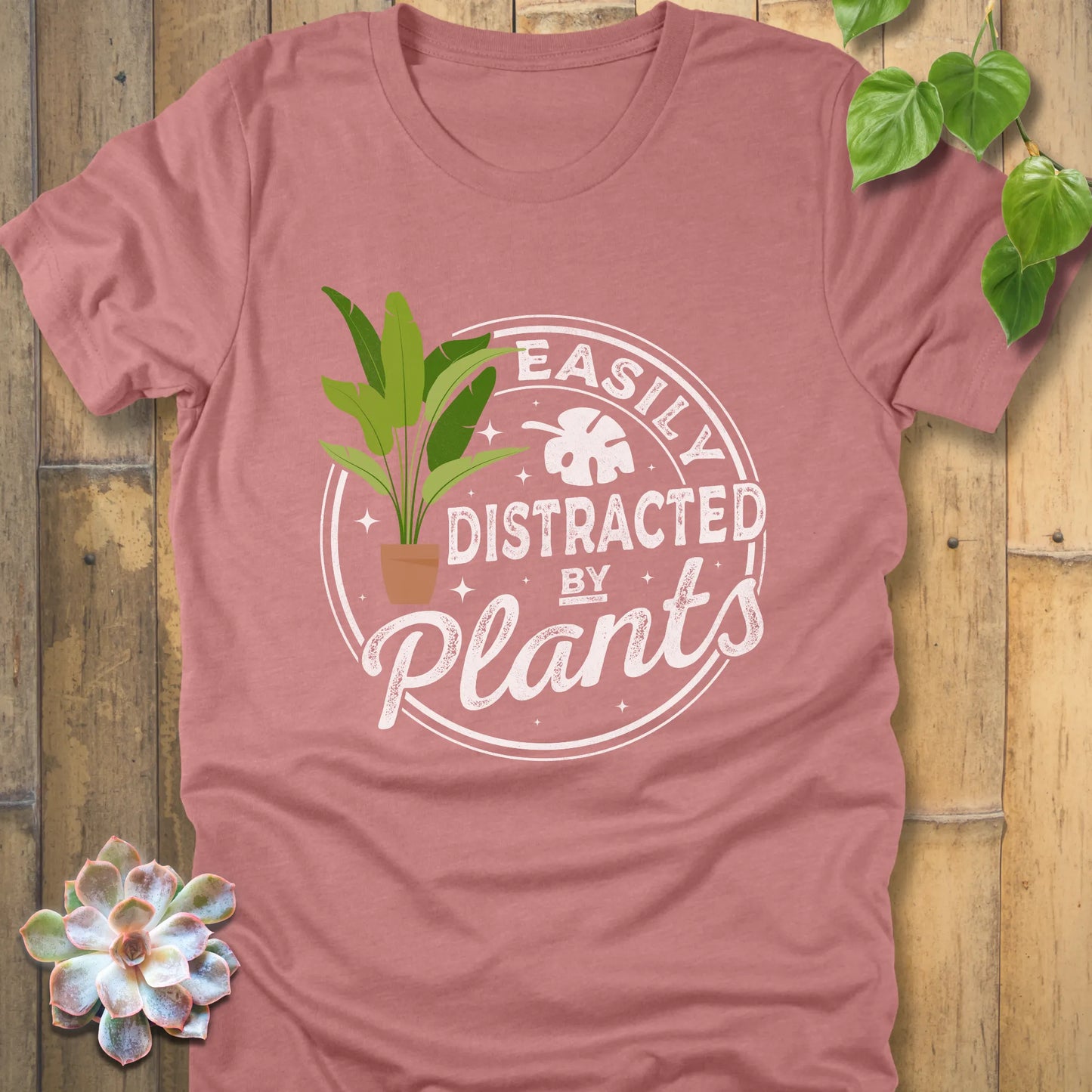 Heather Mauve t-shirt featuring the design Easily Distracted by Plants with a print of a potted plant