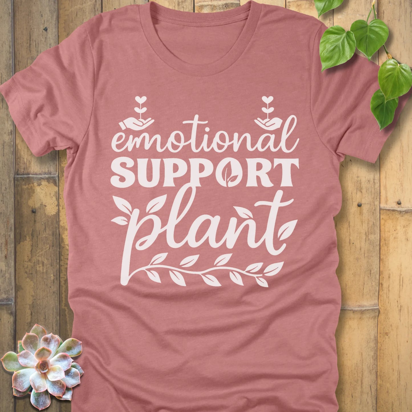Heather Mauve t-shirt featuring the design Emotional Support printed in bold white letters, casual mental health shirt.