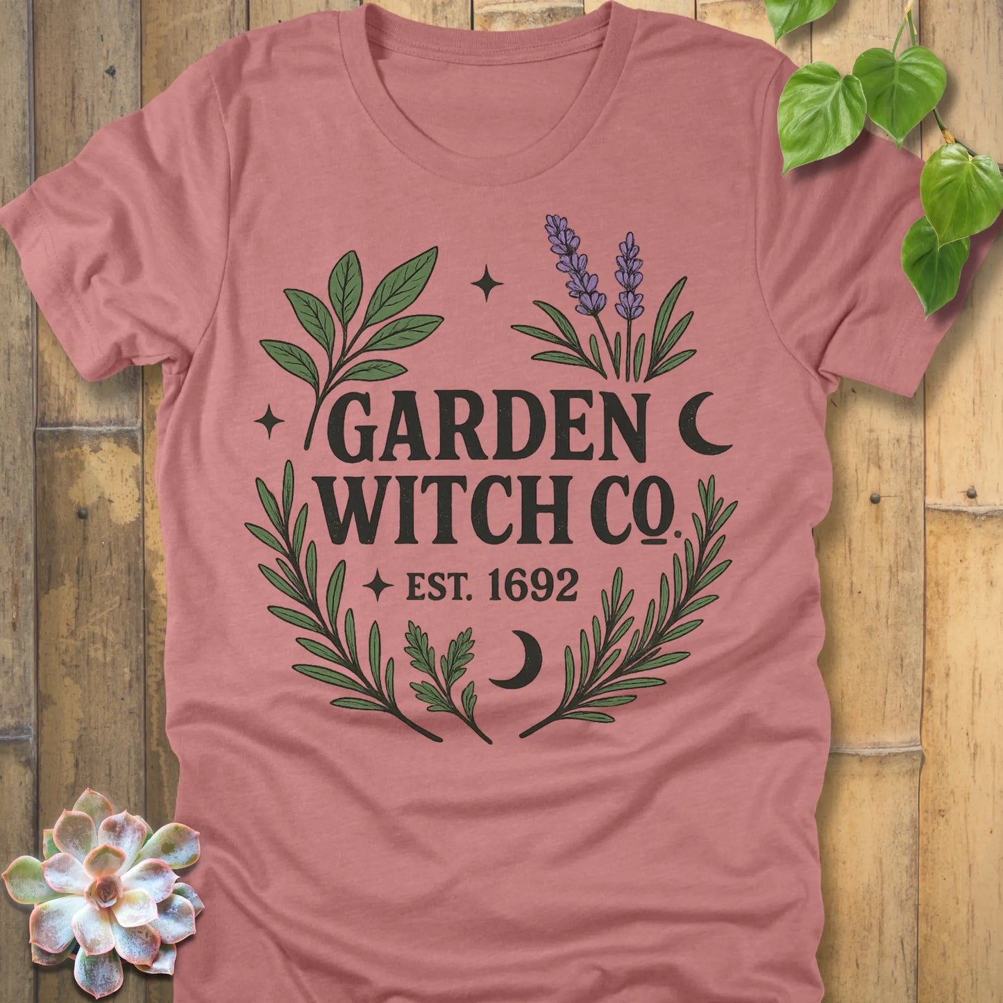 Heather Mauve t-shirt featuring the design Garden Witch printed in witchy garden shirt.