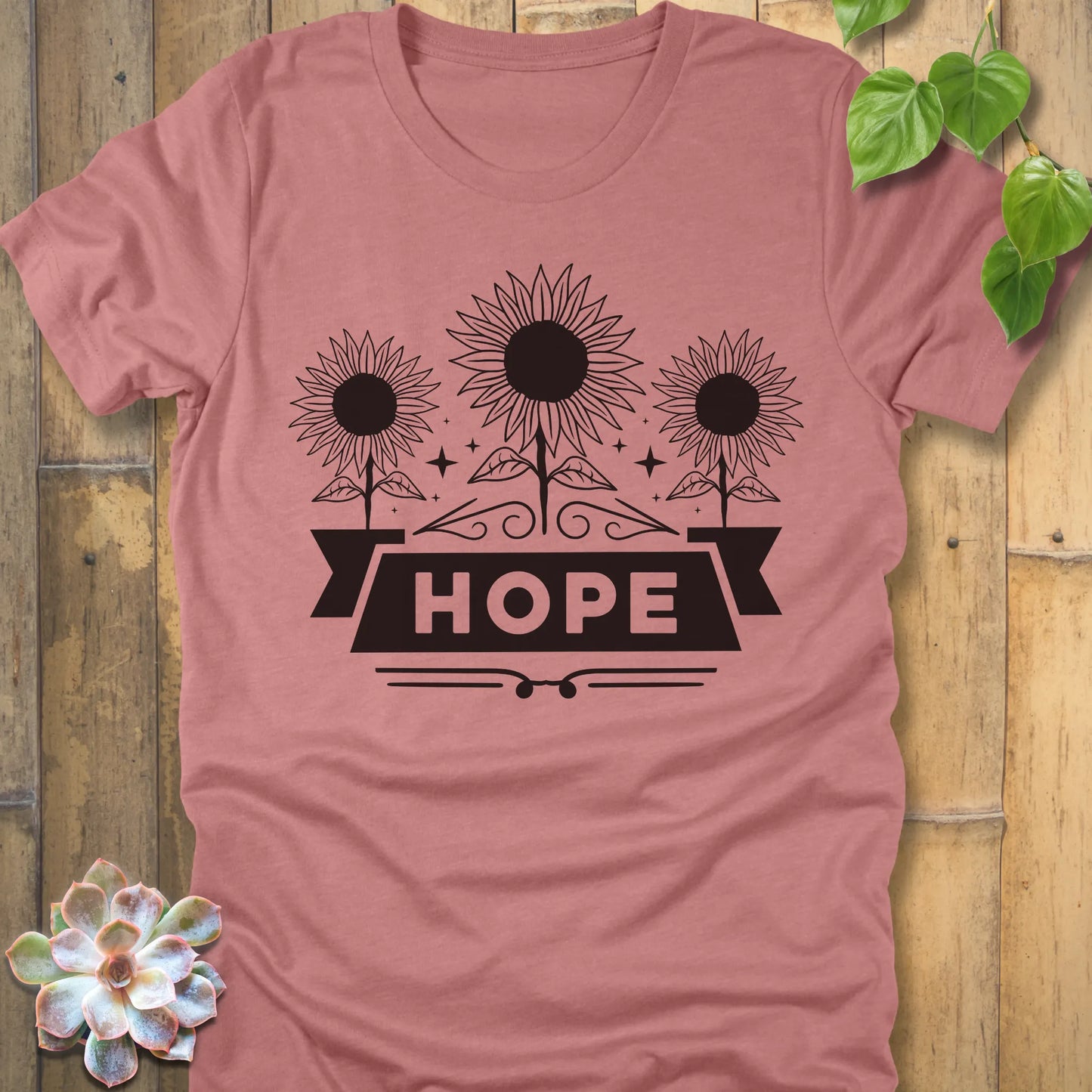 Heather Mauve t-shirt featuring the design Hope with bold letters and 3 sunflower print