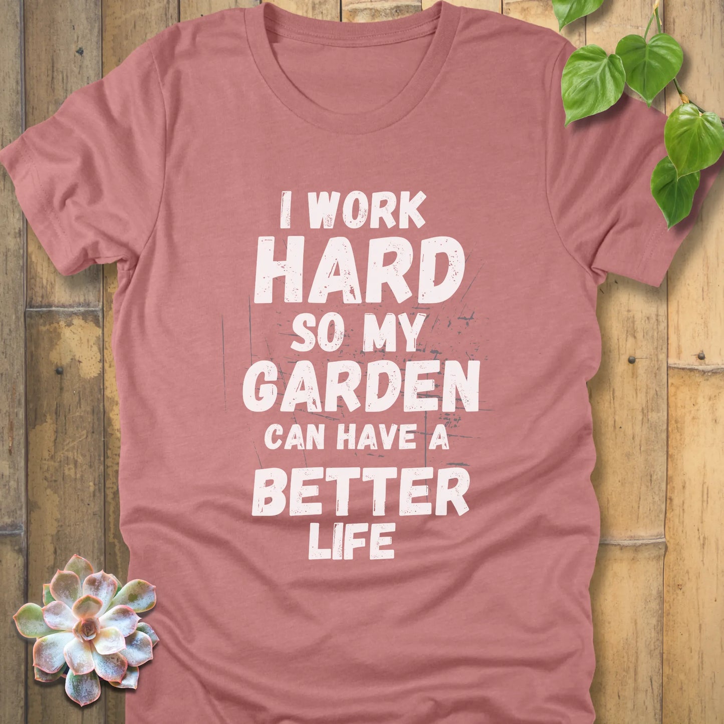 Heather Mauve t-shirt featuring the design I work hard so my garden can have a better life in bold lettering.
