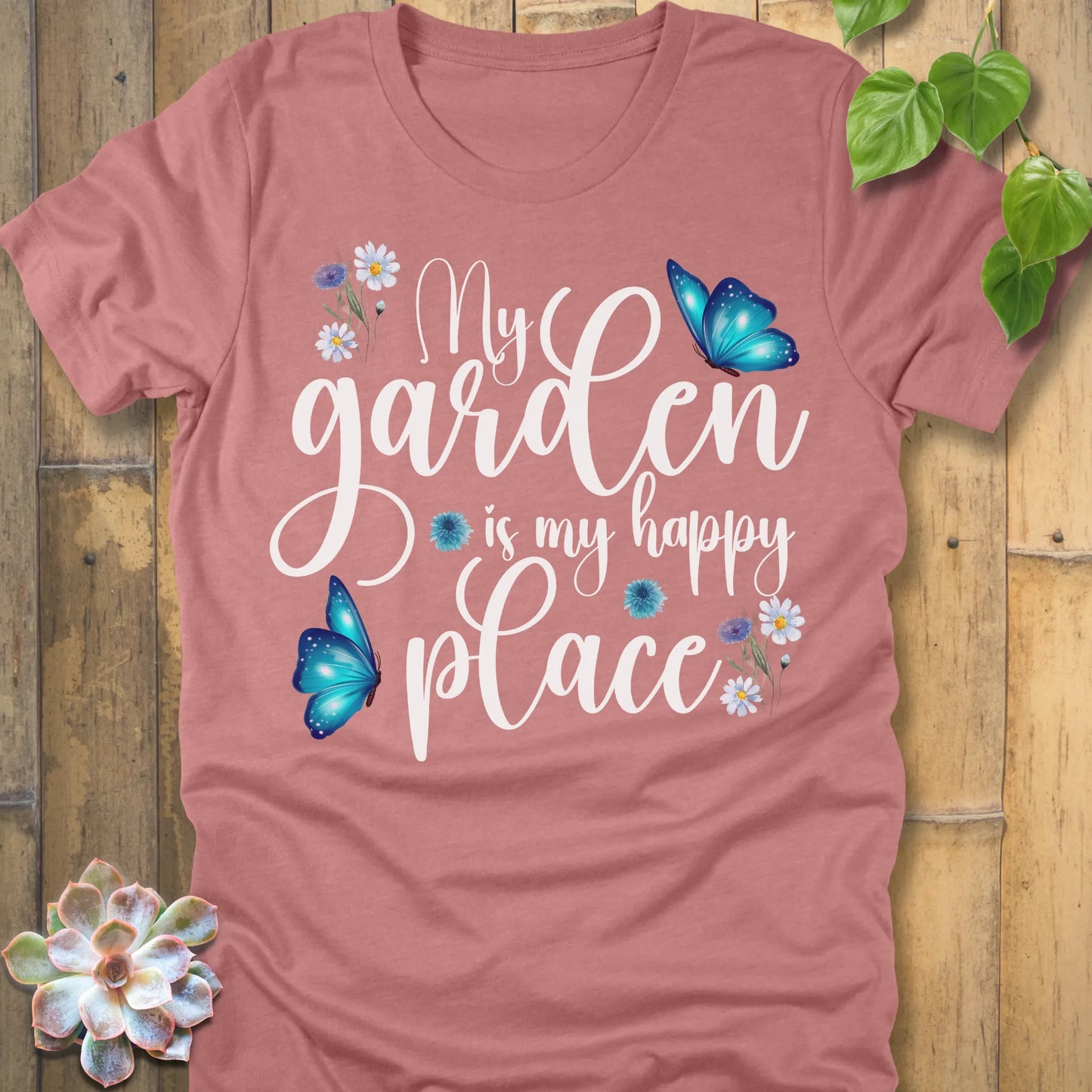 Heather Mauve t-shirt featuring the design My Garden Is My Happy Place with blue butterfly and flowers, funny floral gardening shirt for women.