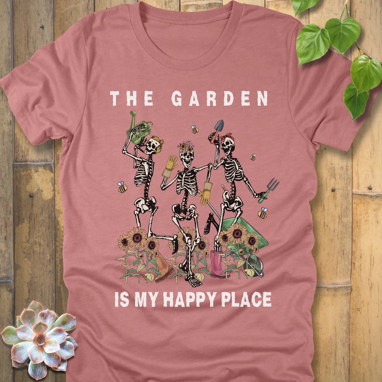 Heather Mauve t-shirt featuring the design "My Happy Place" printed in bold white letters and a happy skeleton 