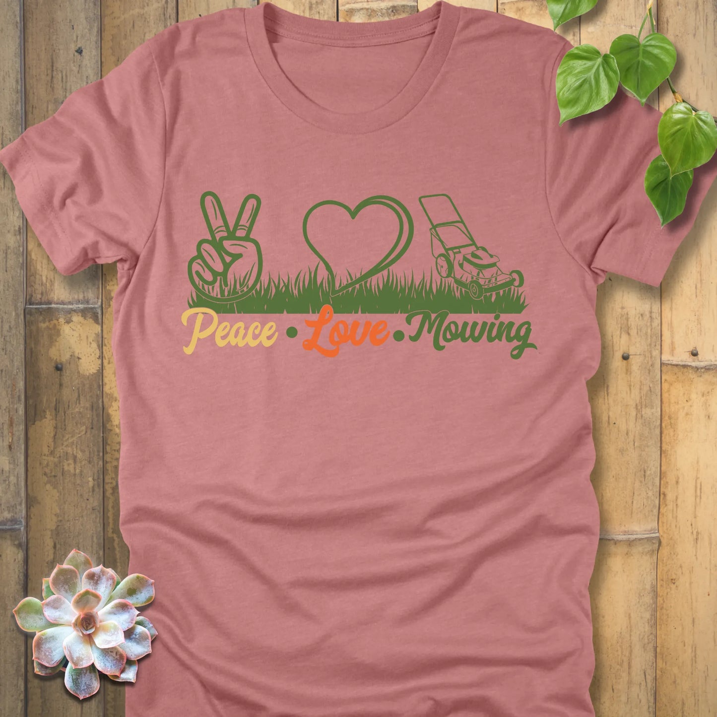 Heather Mauve t-shirt featuring the design Peace, Love, Mowing with peace sign, heart and mower
