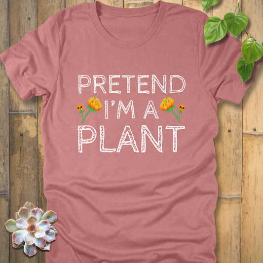 Heather Mauve t-shirt featuring the design Pretend I'm A Plant printed in white letters with plants