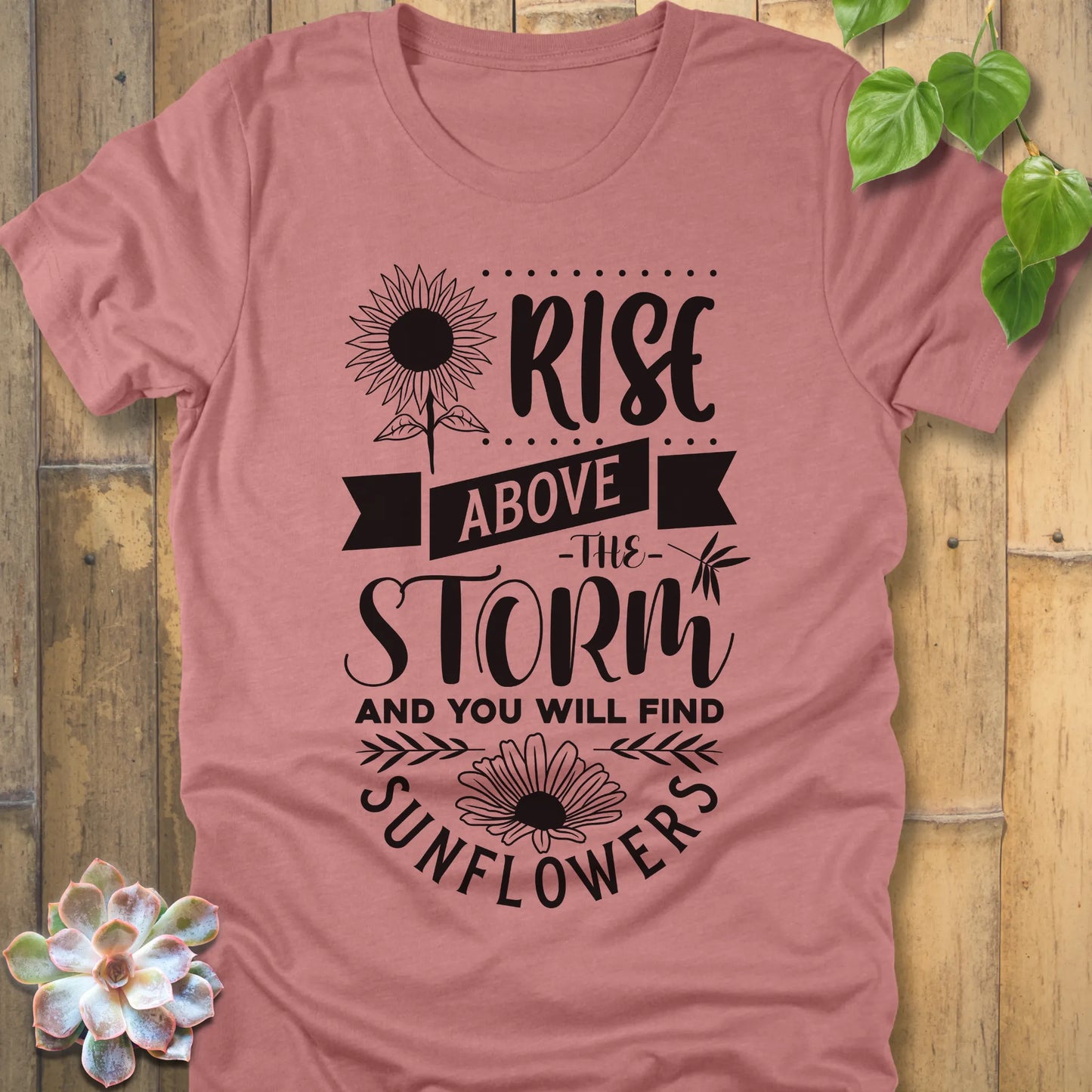 Heather Mauve t-shirt featuring the design Rise above the storm and you will find sunflowers printed in white letters