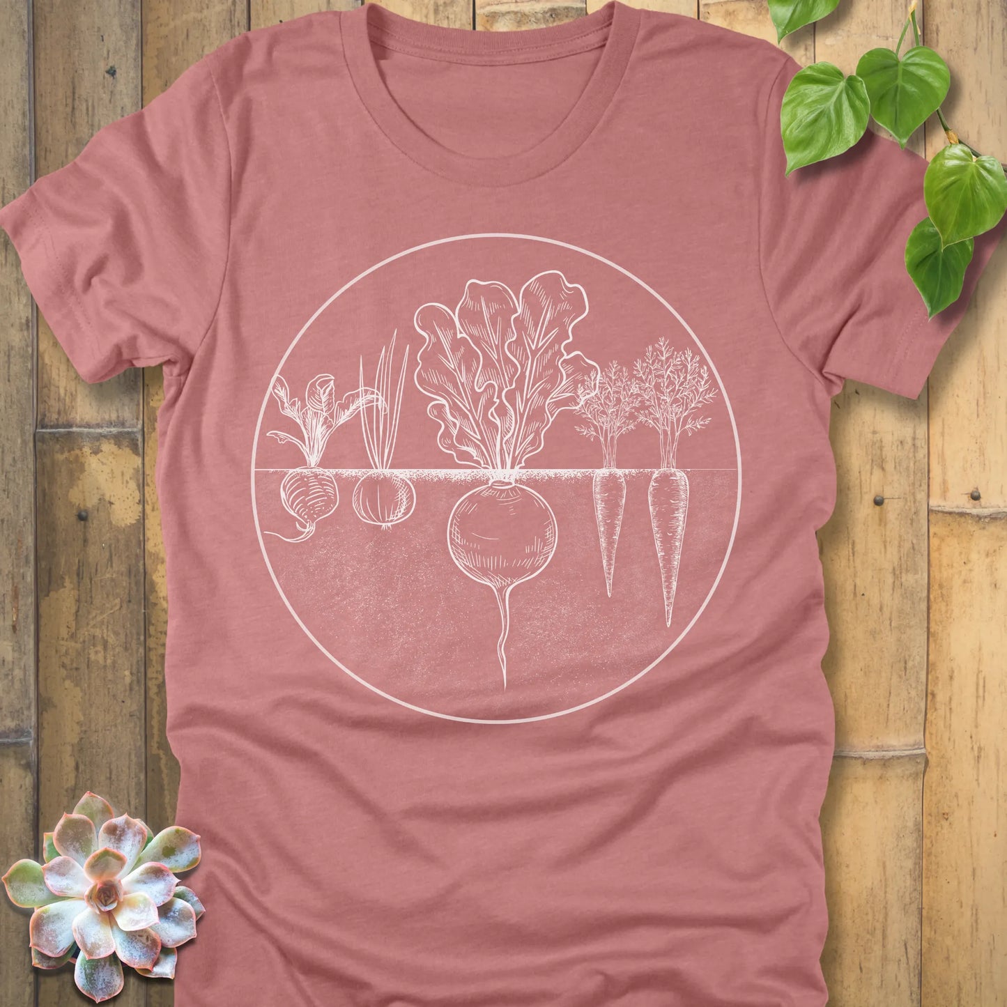 Heather Mauve t-shirt featuring the design Rooted Vegetables printed in white design, organic vegetable shirt.