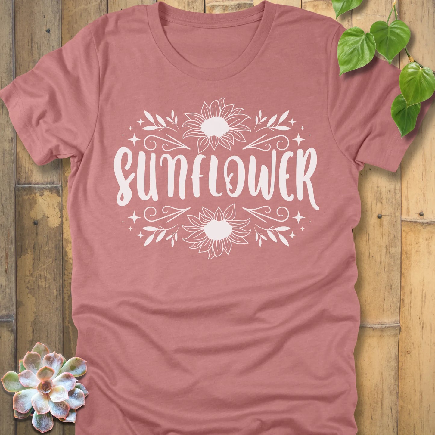 Heather Mauve t-shirt featuring the design Sunflower printed in white letters and sunflower, floral graphic tee.