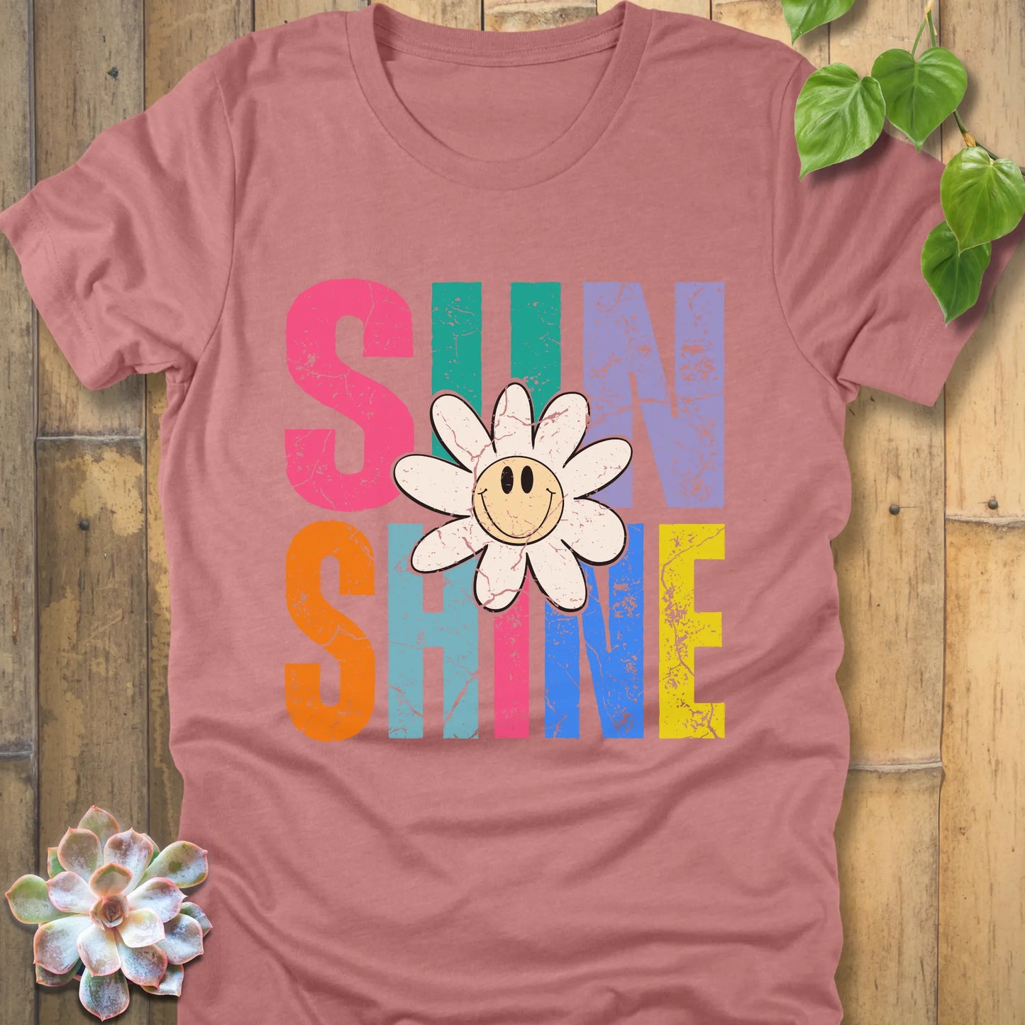 Heather Mauve t-shirt featuring the design Sunshine printed with colourful letters and a sunflower