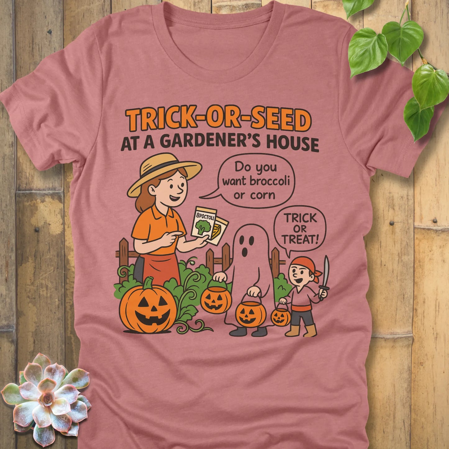Heather Mauve t-shirt featuring the design Trick Or Seed printed in funny Halloween gardening shirt.