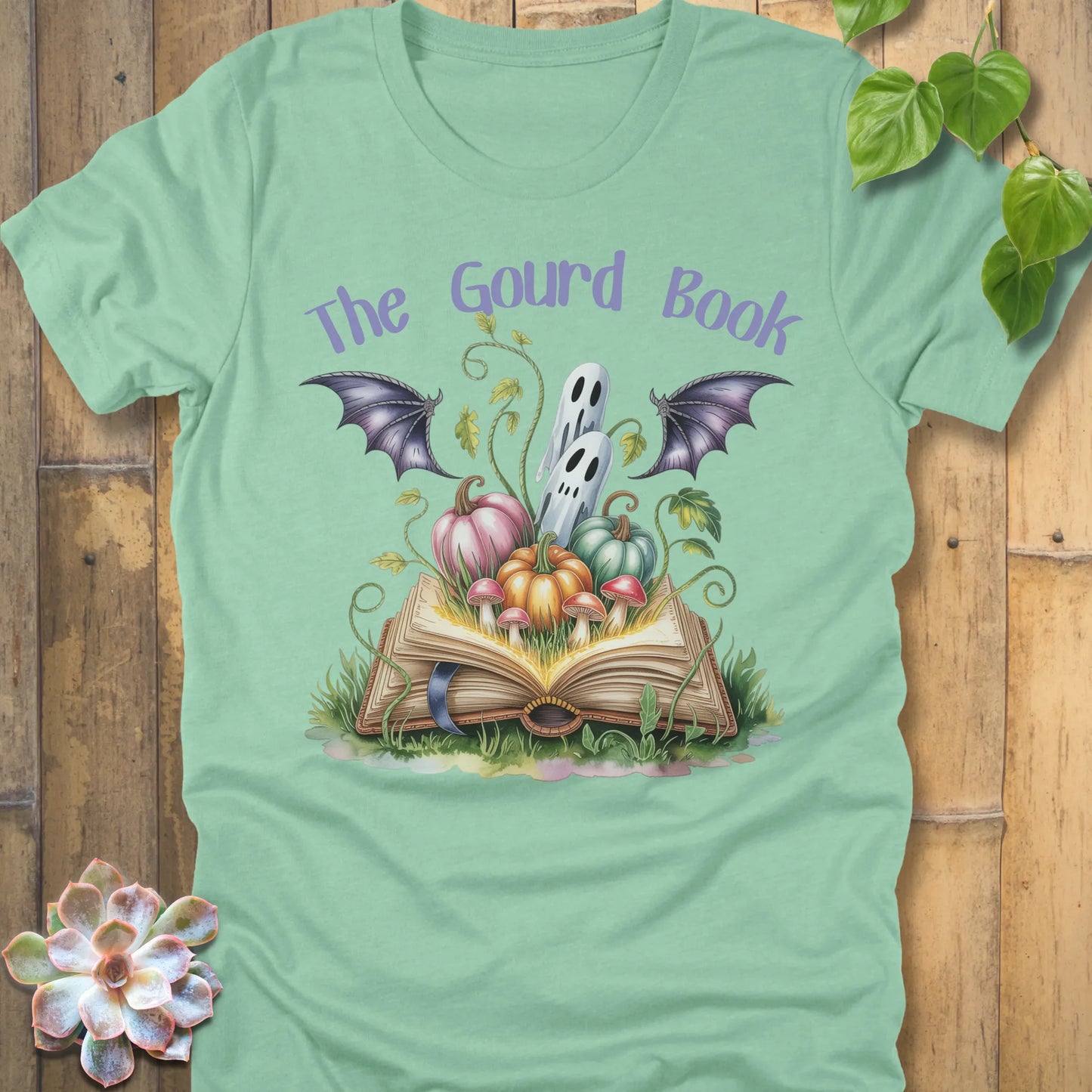 Heather Mint t-shirt featuring the design The Guard Book T-Shirt printed with a halloween design