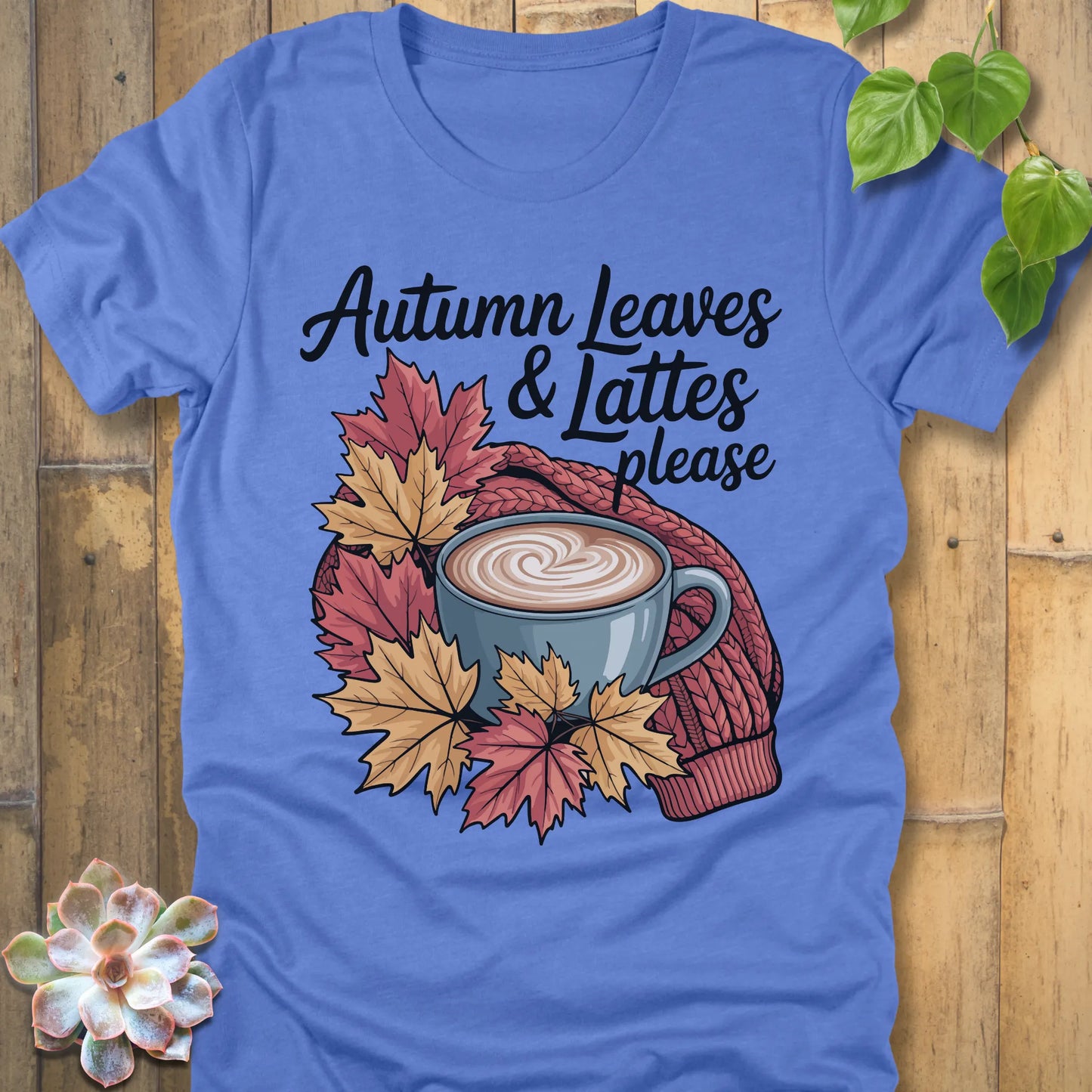 Heather Navy t-shirt featuring the design Autumn Leaves & Lattes printed in black letters with a mug of coffee and leaves