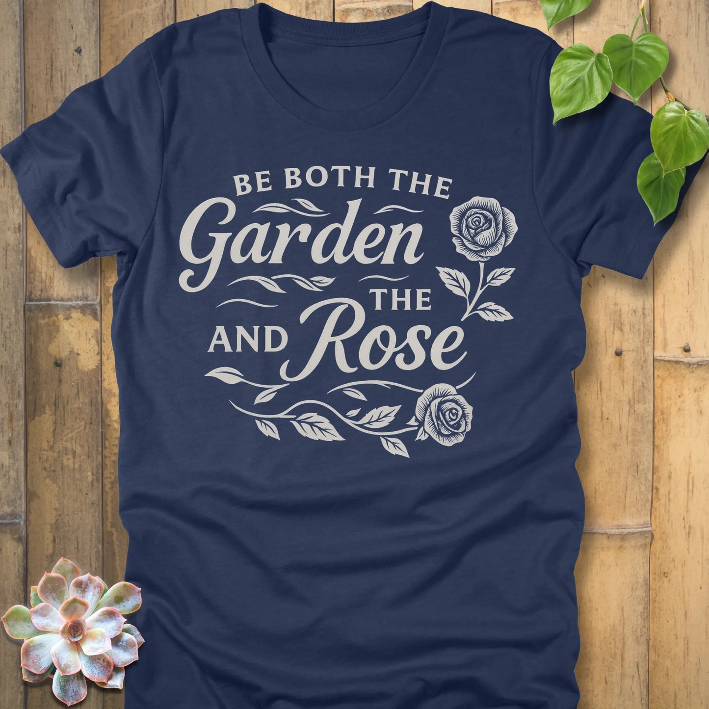 Heather Navy t-shirt featuring the design Garden and the Rose printed in bold letters, floral gardening shirt.