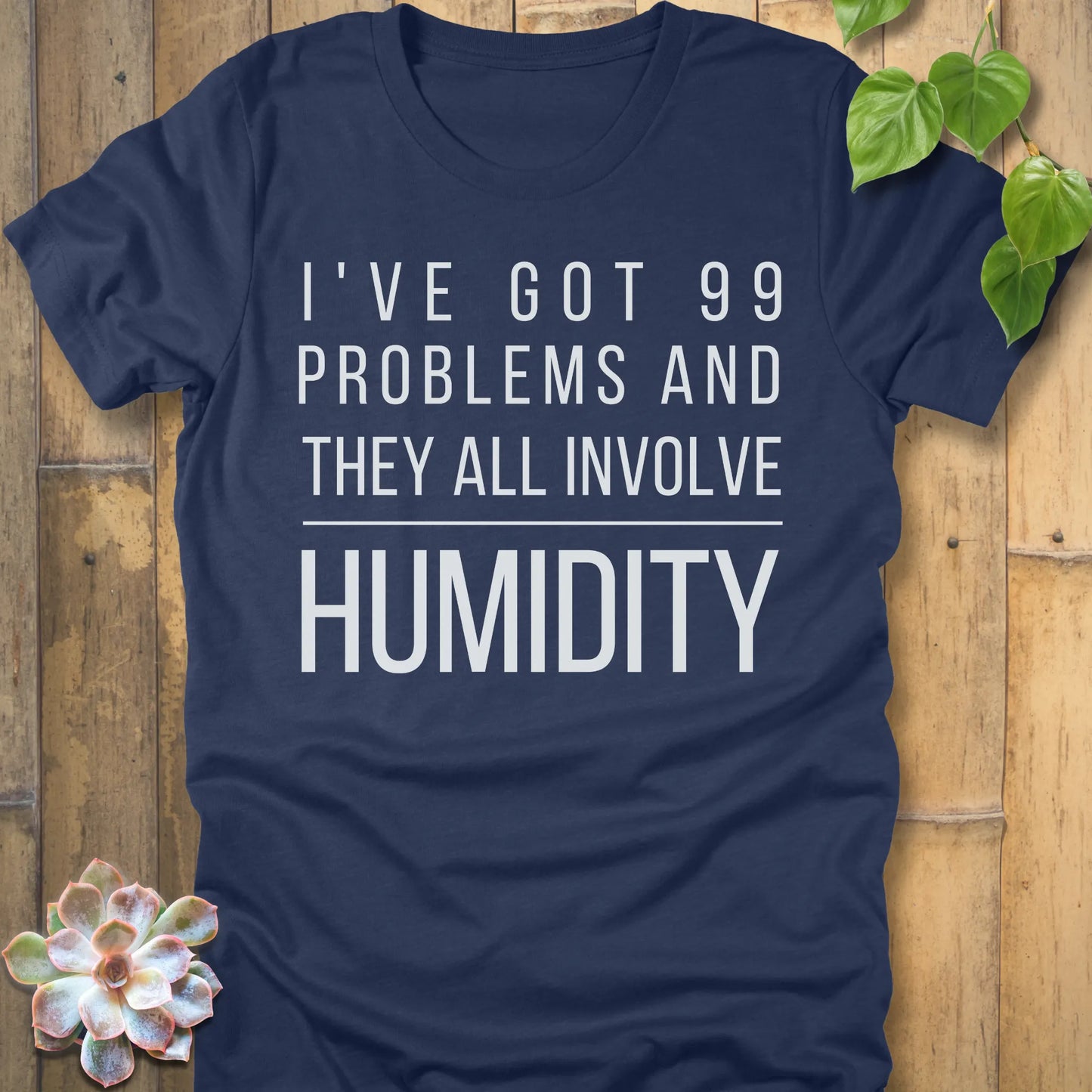 Heather Navy t-shirt featuring the design I've Got 99 Problems printed in bold white letters