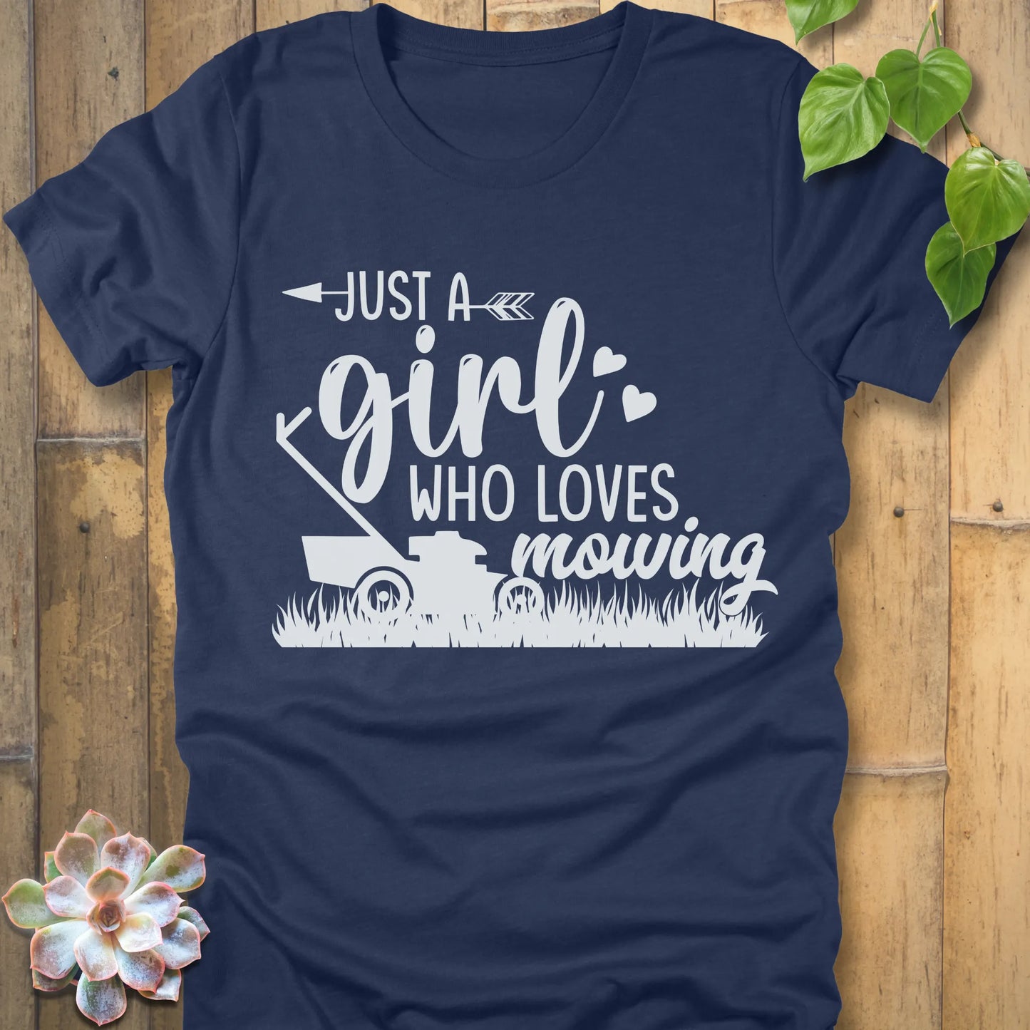 Heather Navy t-shirt featuring the design Just a girl who loves mowing printed with a lawn mower graphic.
