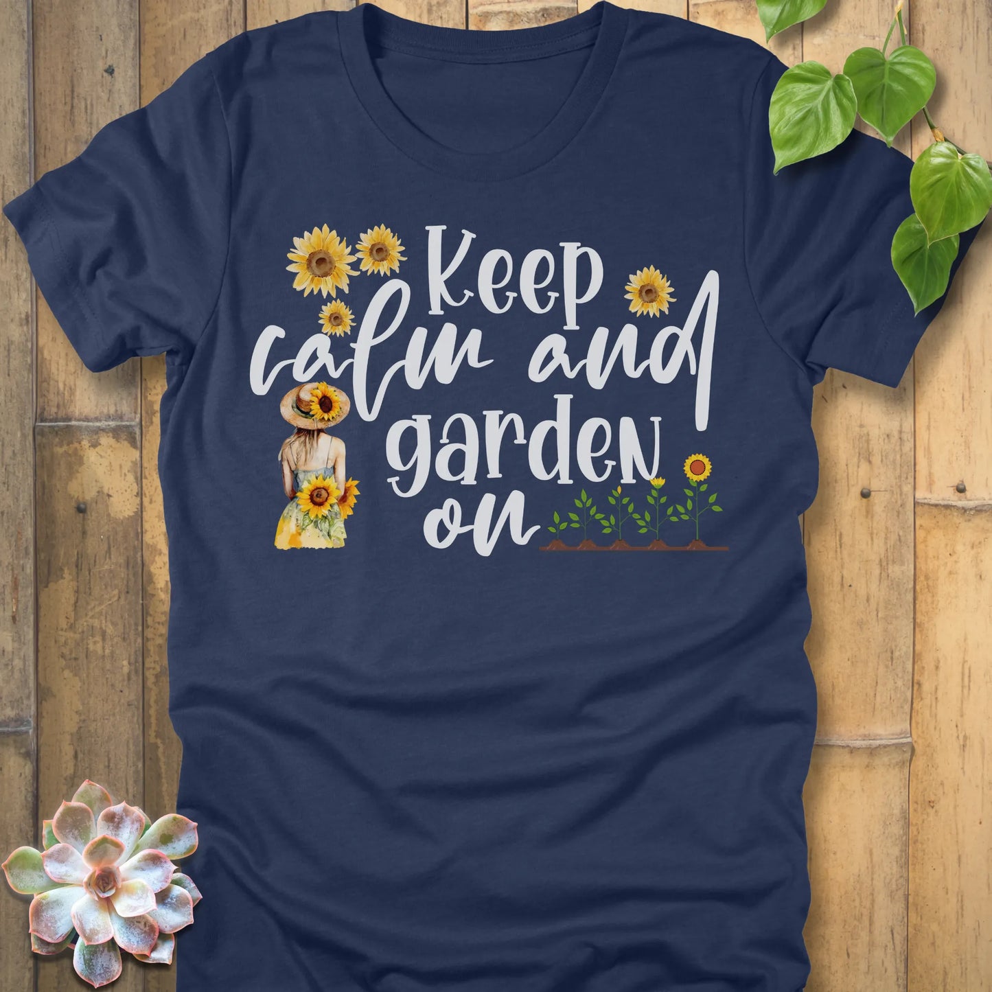 Heather Navy t-shirt featuring the design Keep Calm printed in white letters and sunflowers