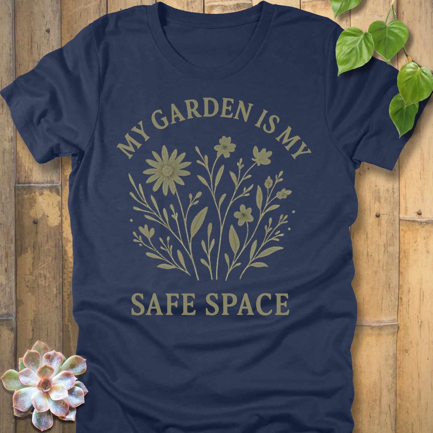 Heather Navy t-shirt featuring the design My Garden Is My Safe Place printed in bold letters, gardening shirt for plant lovers.