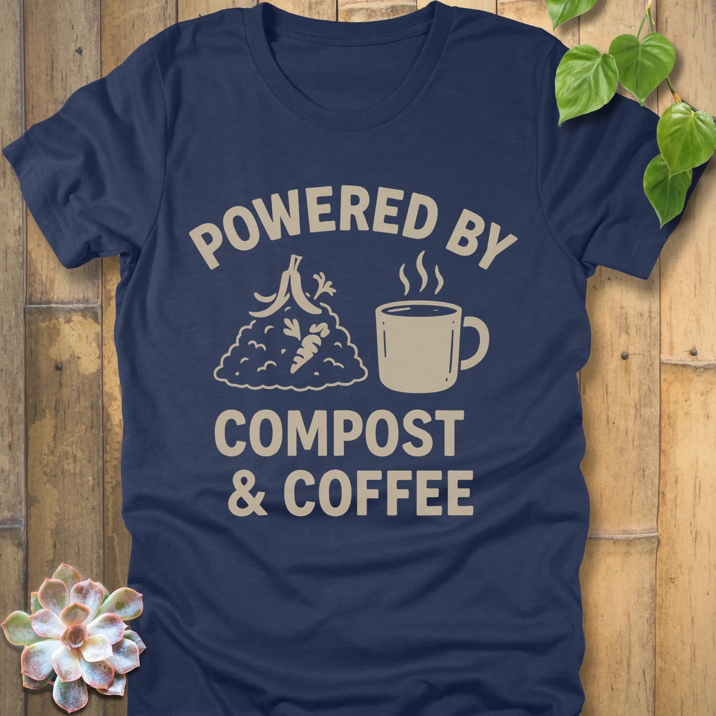 Heather Navy t-shirt featuring the design Powered By Compost & Coffee printed in bold letters with mug of coffee