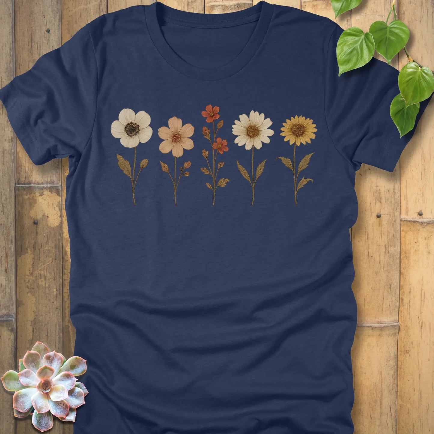 Heather Navy t-shirt featuring the design Pressed Flowers printed in delicate floral pattern, botanical graphic tee.