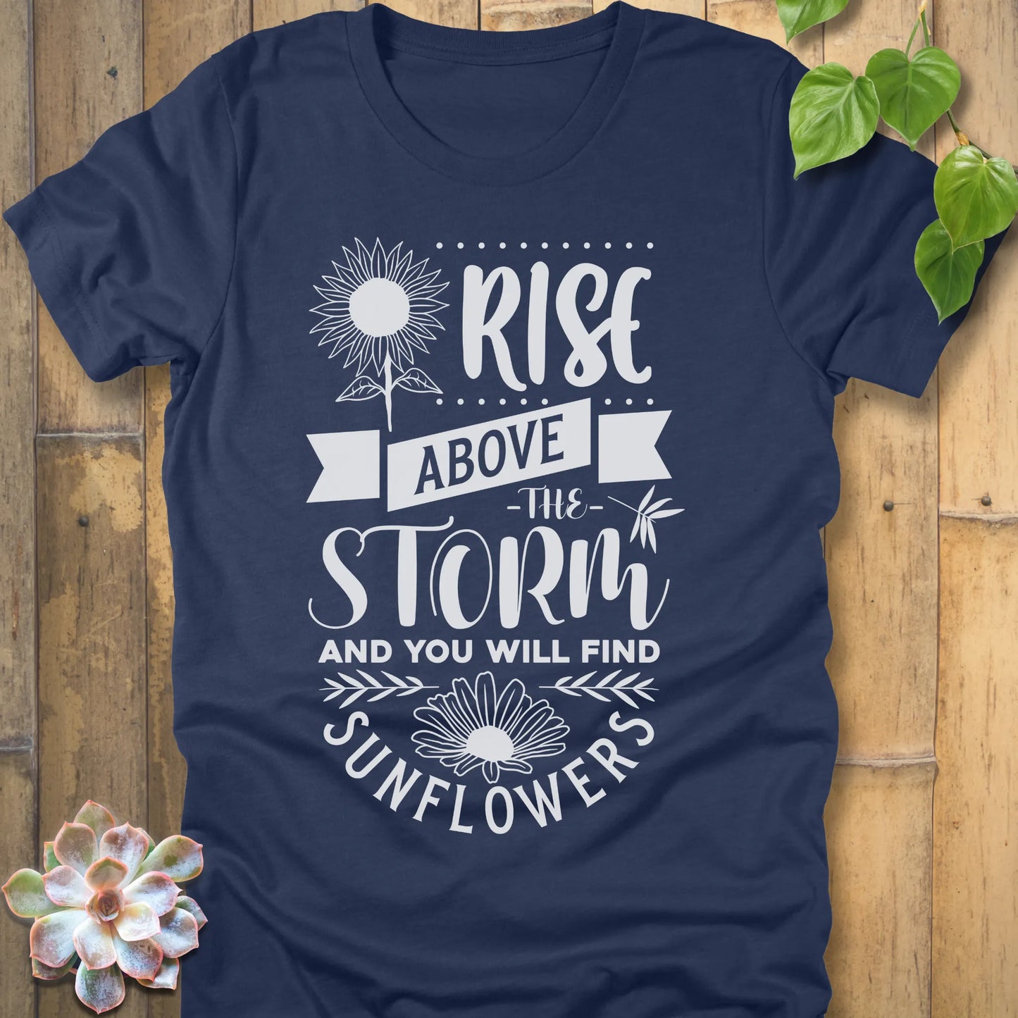 Heather Navy t-shirt featuring the design Rise above the storm and you will find sunflowers printed in white letters