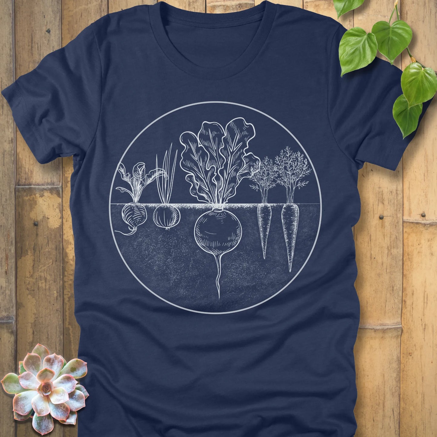 Heather Navy t-shirt featuring the design Rooted Vegetables printed in white design, organic vegetable shirt.