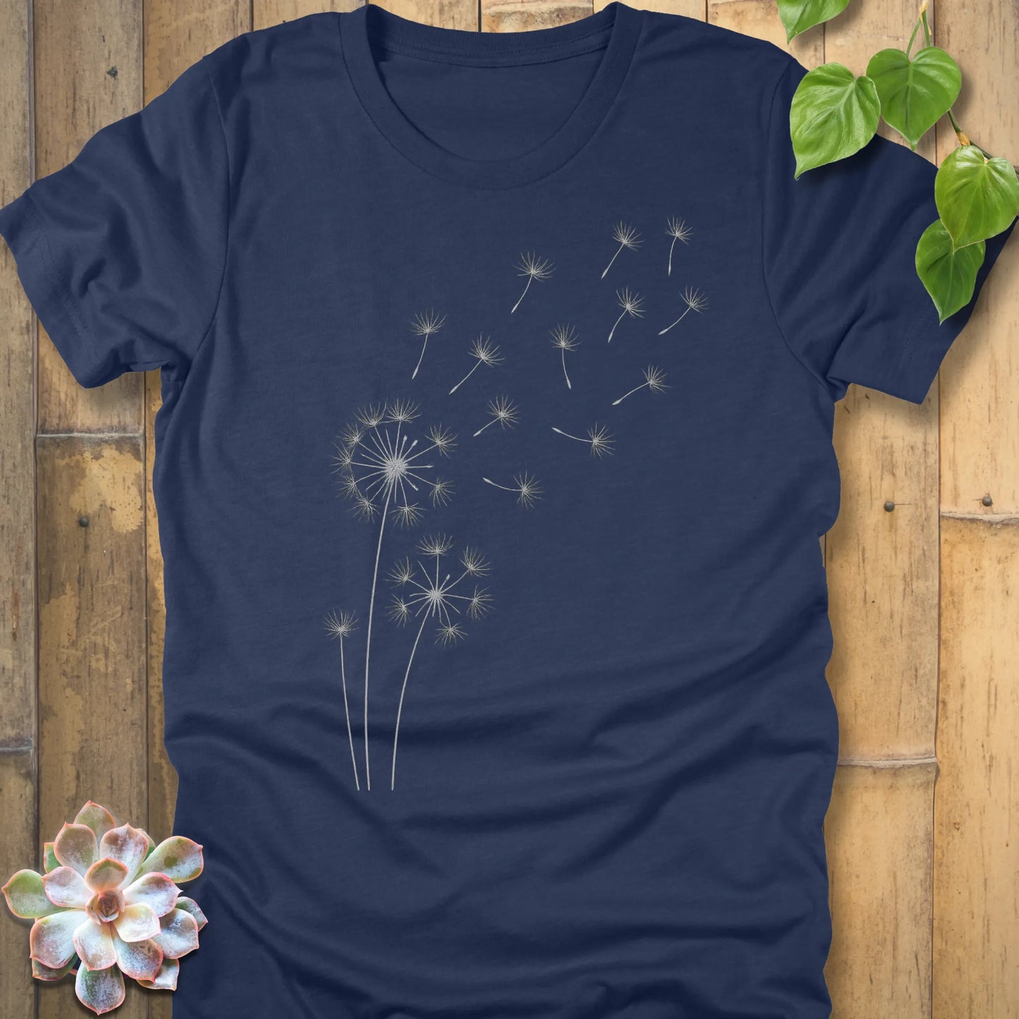 Heather Navy t-shirt featuring the design Wishes Come True printed in floral graphic tee.