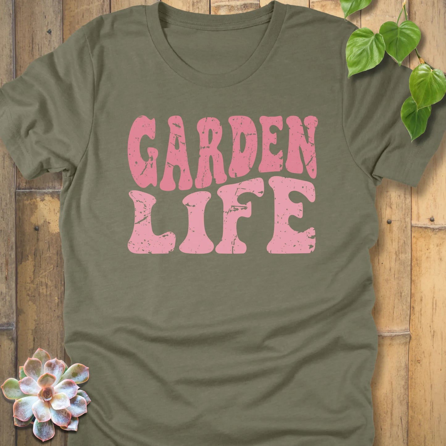 Heather Olive t-shirt featuring the Garden Life graphic tee design in bold pink letters, casual graphic shirt