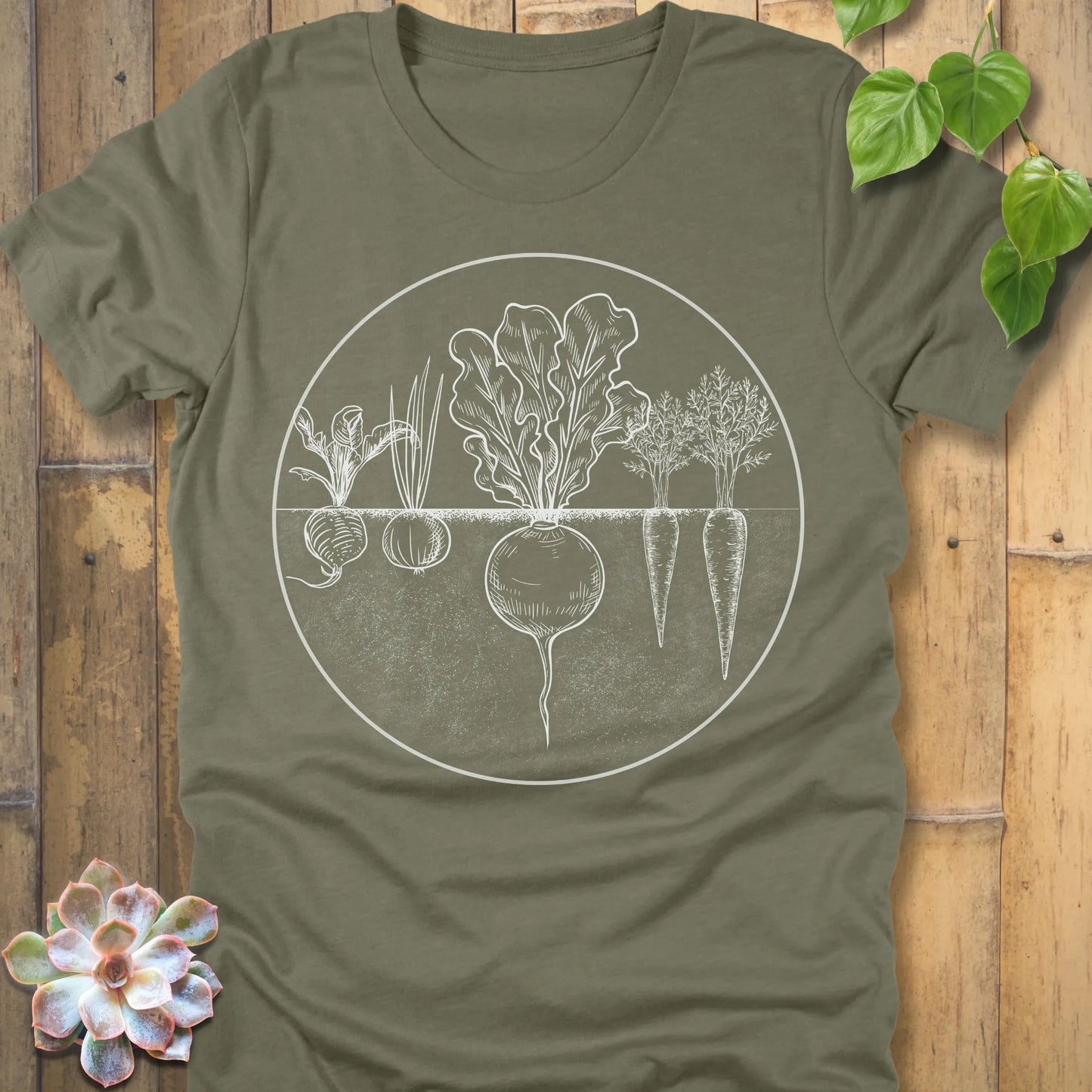 Heather Olive t-shirt featuring the design Rooted Vegetables printed in white design, organic vegetable shirt.