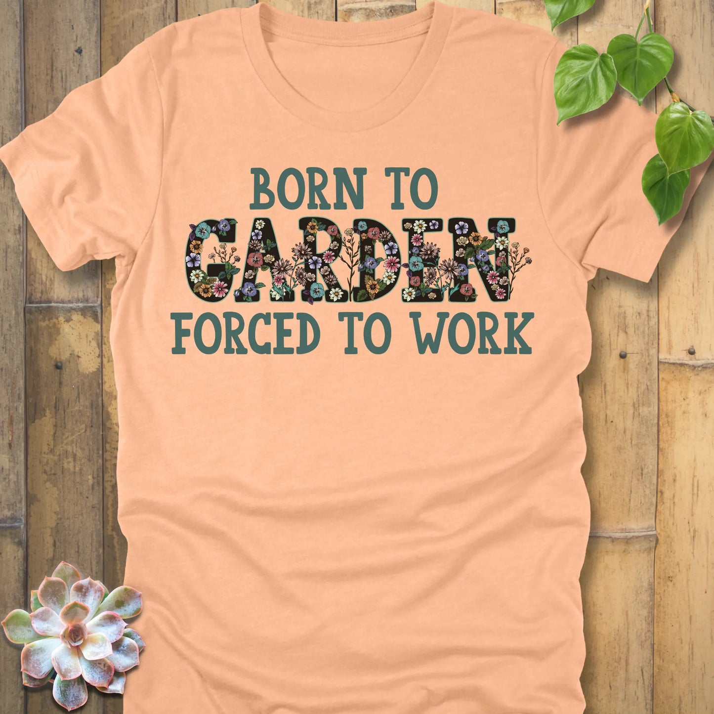 Heather Peach t-shirt featuring the design Born To Garden printed in bold letters, gardening lover shirt