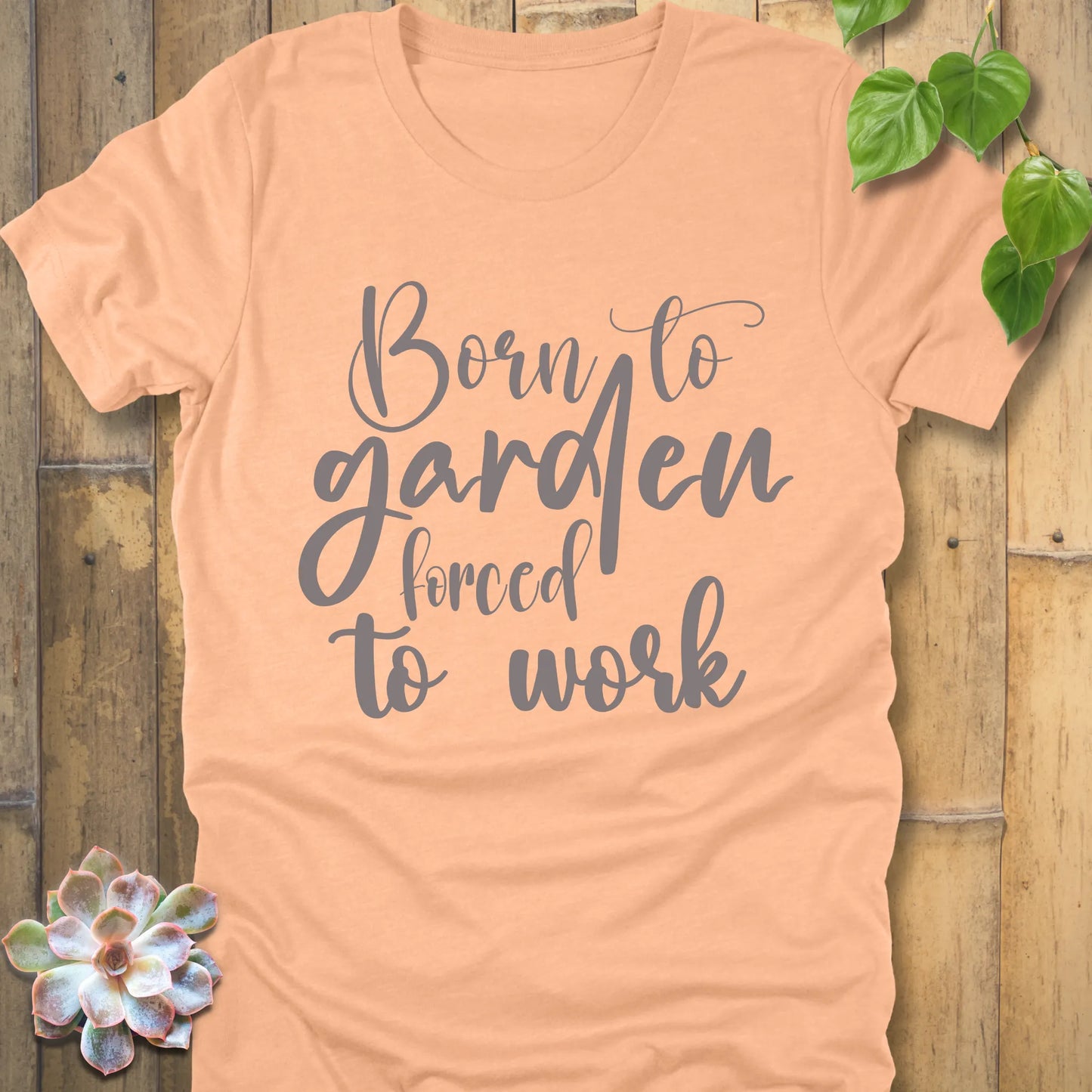 Heather Peach t-shirt featuring the design Born to garden force to work printed in white letters