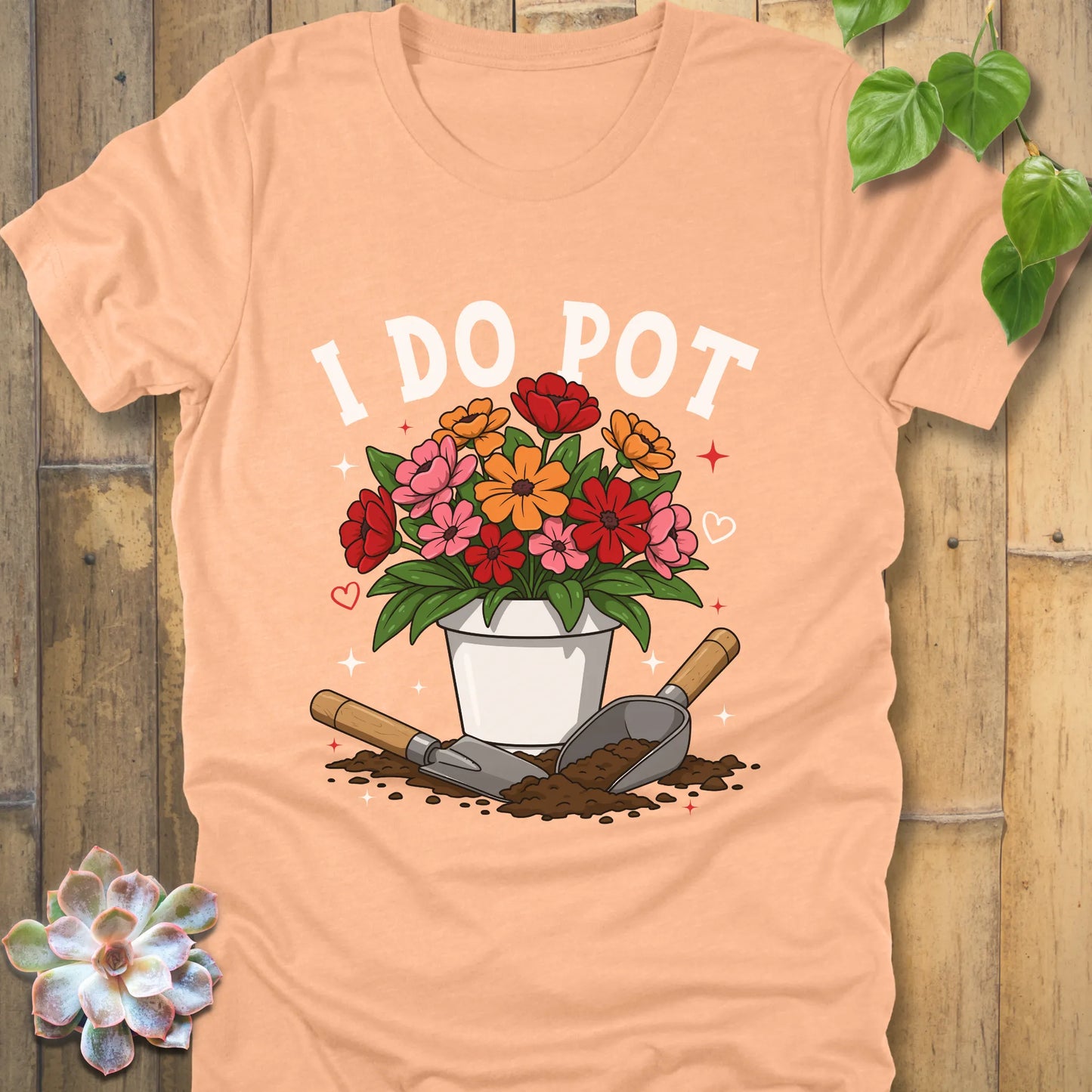 Heather Peach t-shirt featuring the design I Do Pot printed in bold letters with plants in the pot