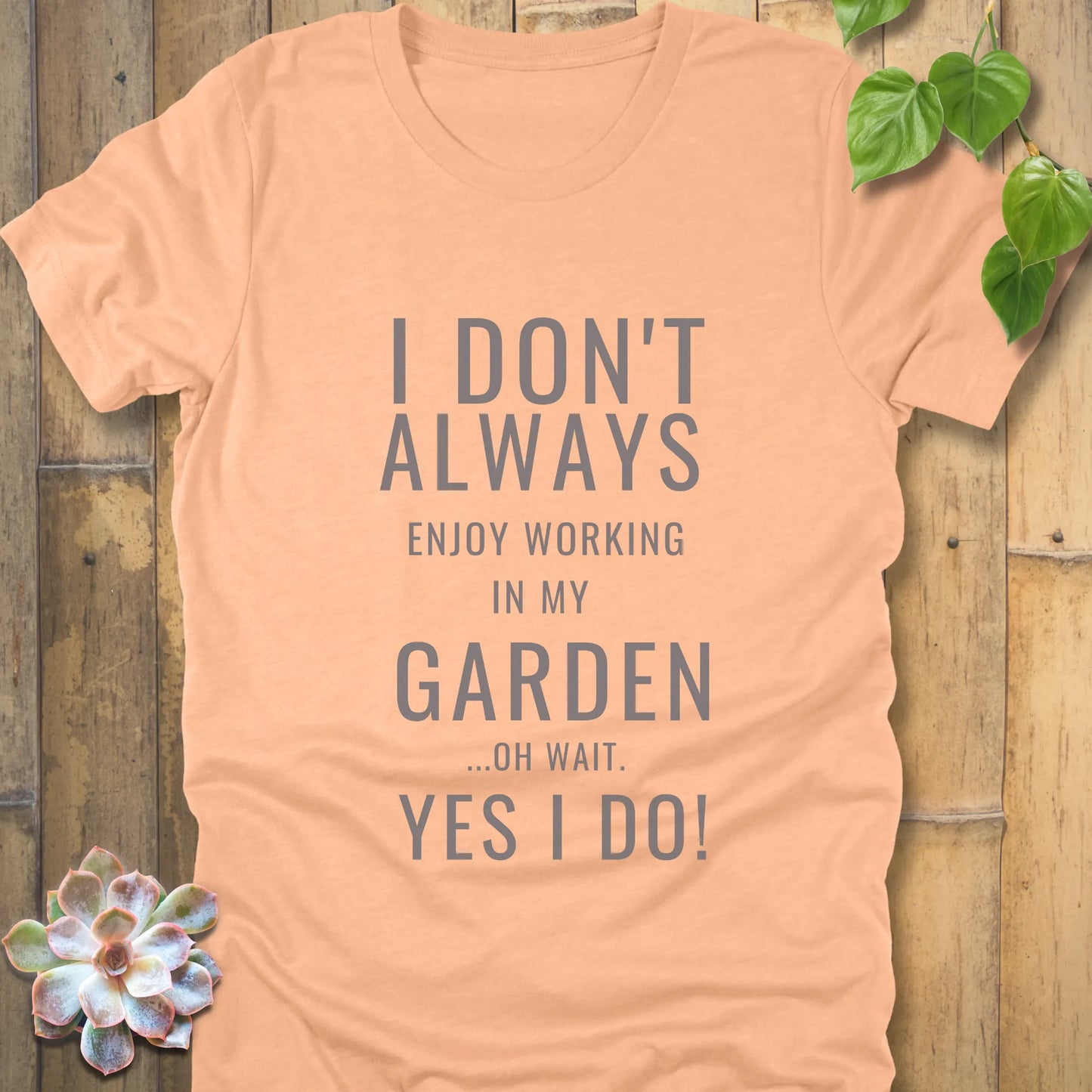 Heather Peach t-shirt featuring the design "I don't always enjoy working in my garden, oh wait yes I do" printed in bold black letters