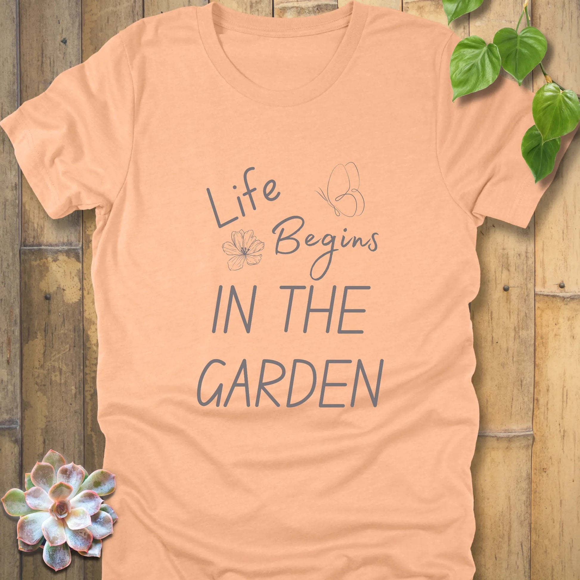 Heather Peach t-shirt featuring the design Life begin's in the garden, floral gardening gift shirt.