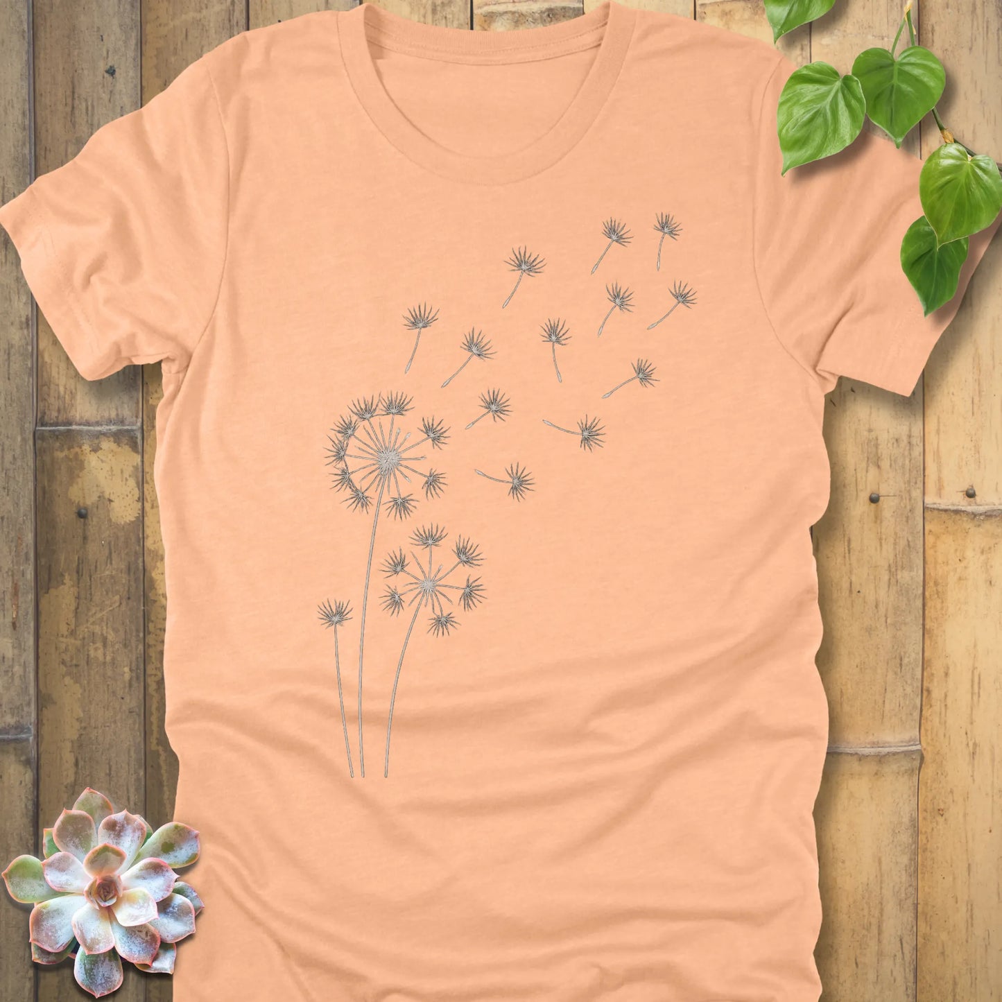 Heather Peach t-shirt featuring the design Wishes Come True printed in floral graphic tee.
