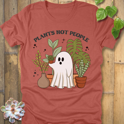Heather clay t-shirt featuring the design Plants Not People printed in bold letters with halloween design a ghost holding plants