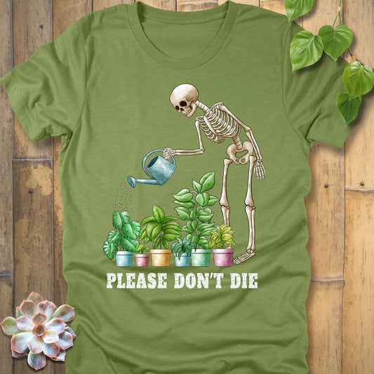 Heather green t-shirt featuring the design Please Don’t Die with skeleton watering plants print