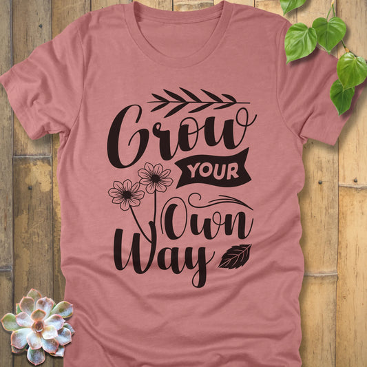 Heather mauve cotton graphic t-shirt featuring the inspirational phrase Grow your own way, stylish casual wear.