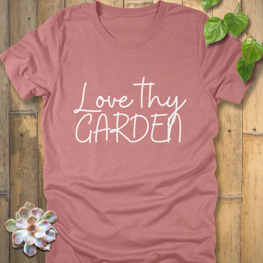 Heather mauve t-shirt featuring the design Love Thy Garden printed in white letters